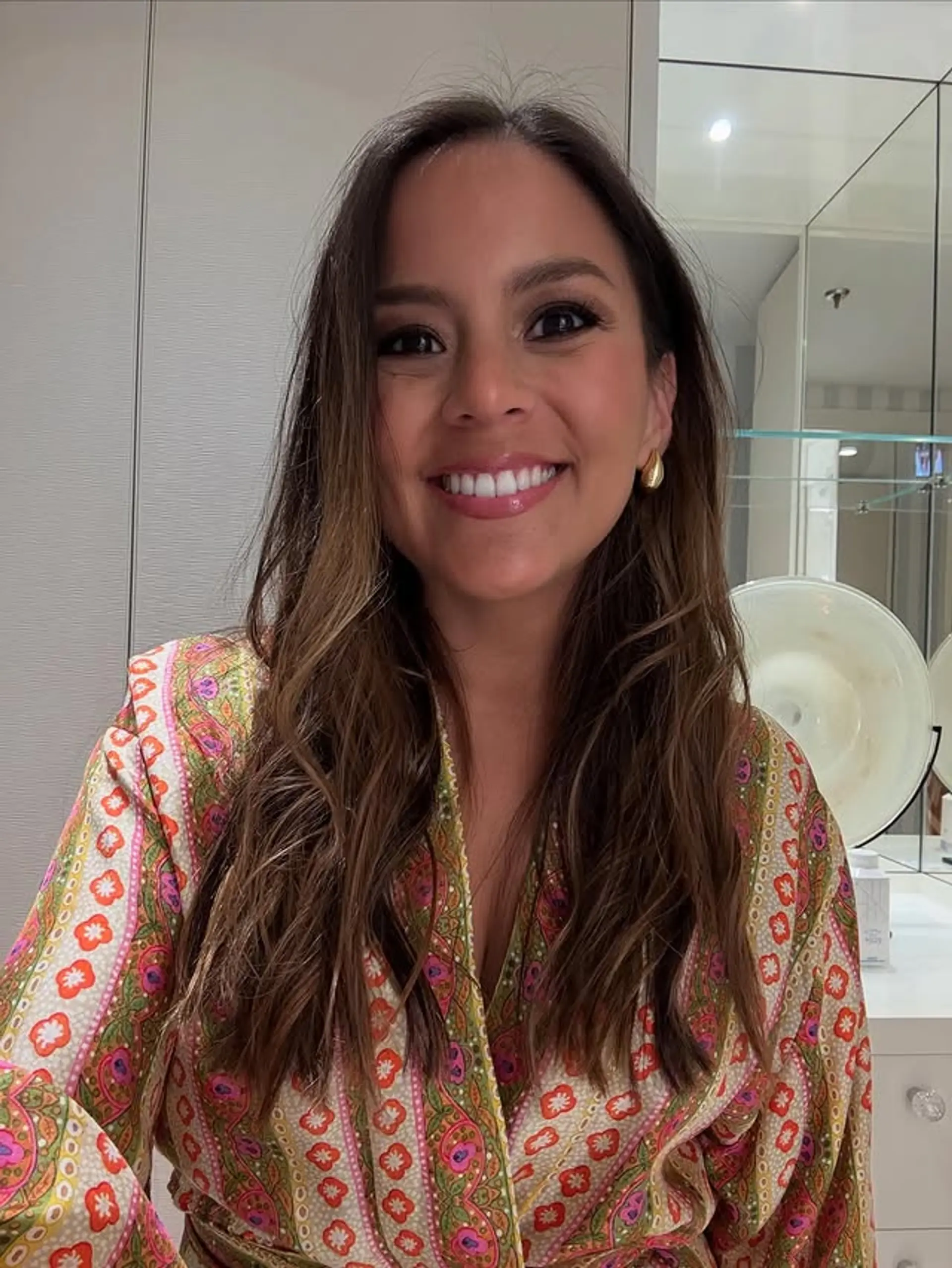 Long, wavy hair with a bronde balayage and subtle face-framing layers. 1