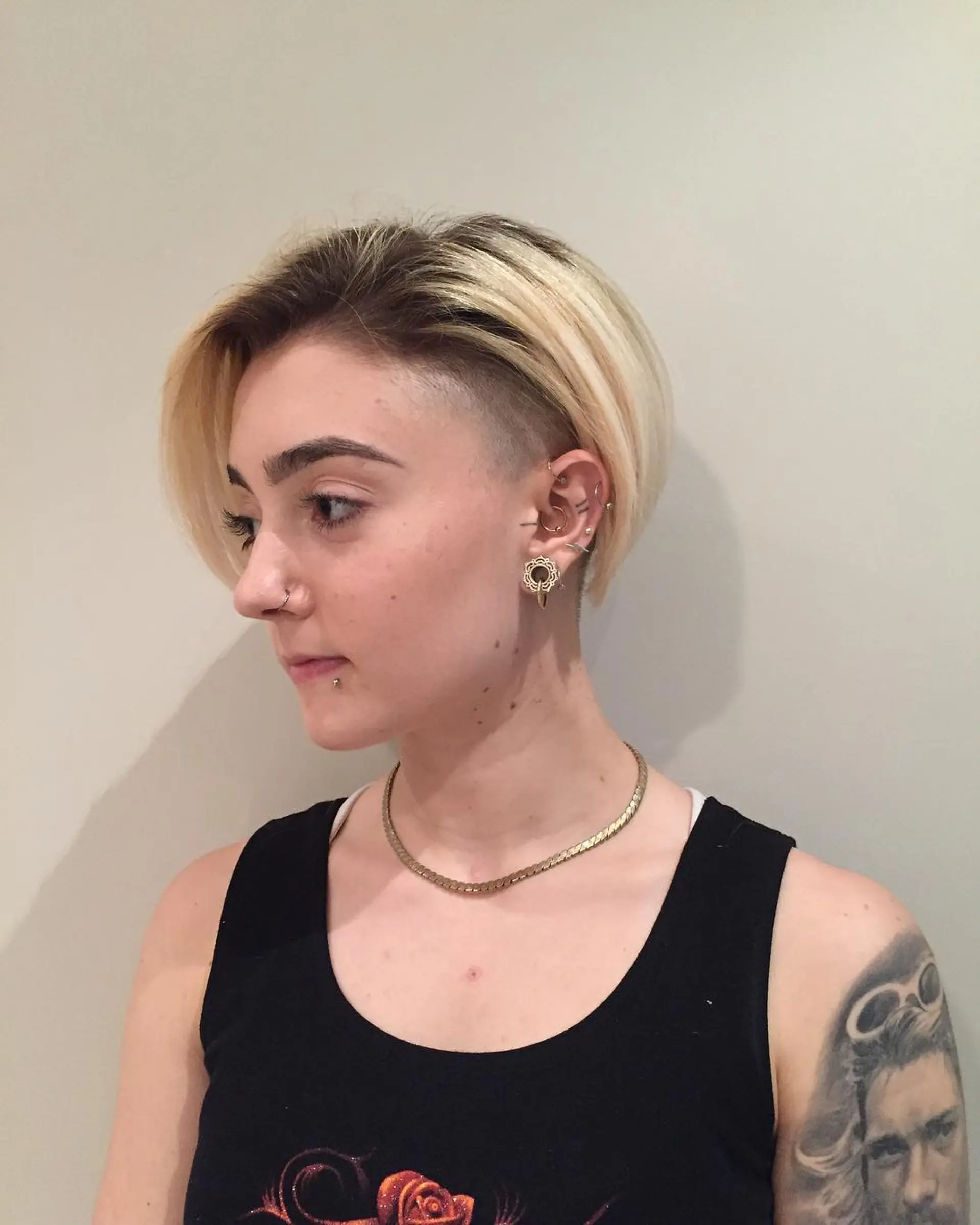 A short blonde bob with an edgy undercut. 1
