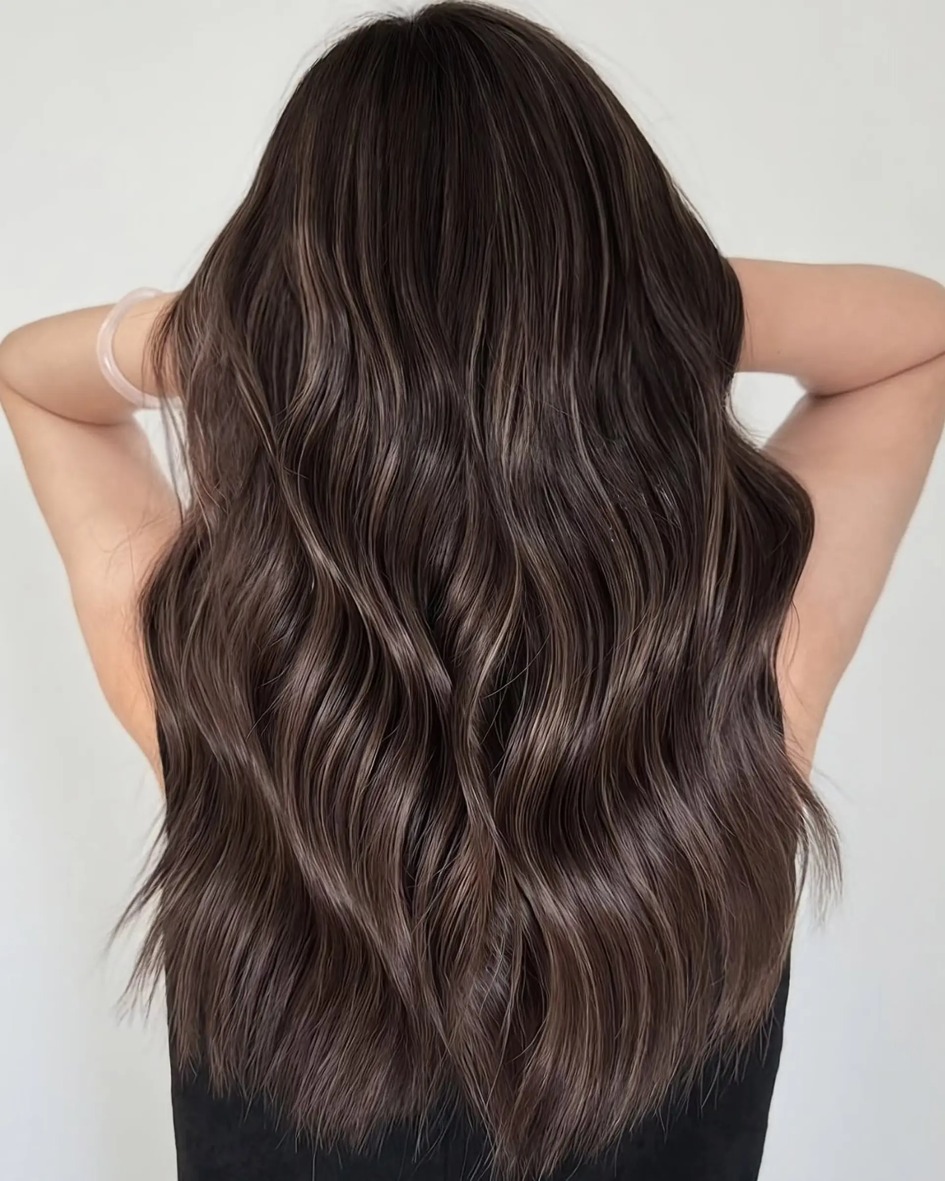 A seamless ash brown balayage with soft, natural-looking highlights. 1