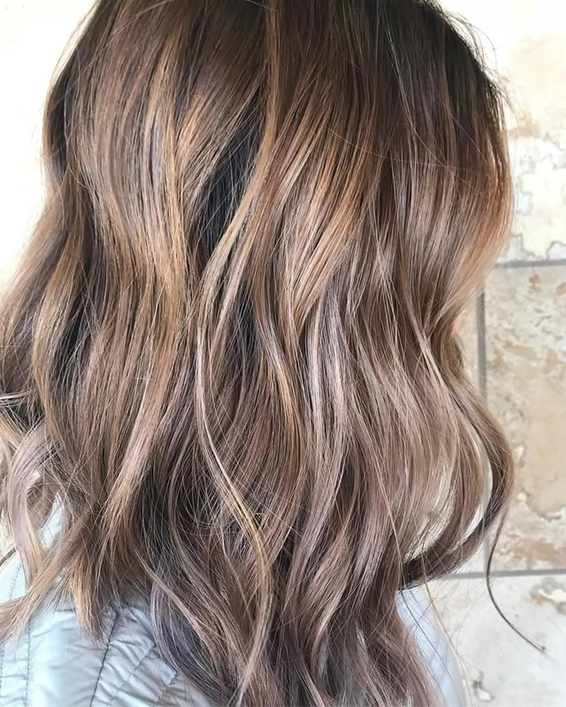 A medium-length bronde balayage with subtle waves. 1