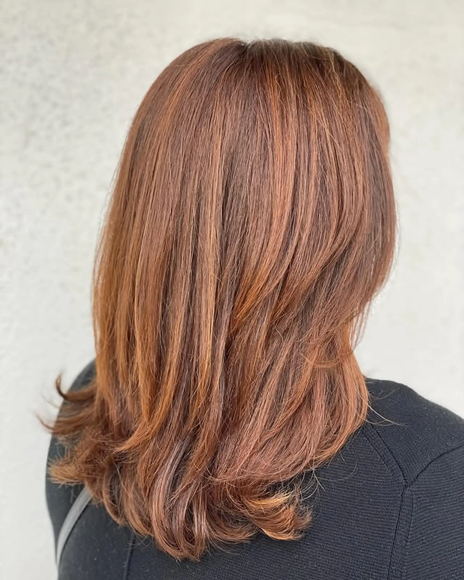 A layered lob with bronde and copper balayage. 1