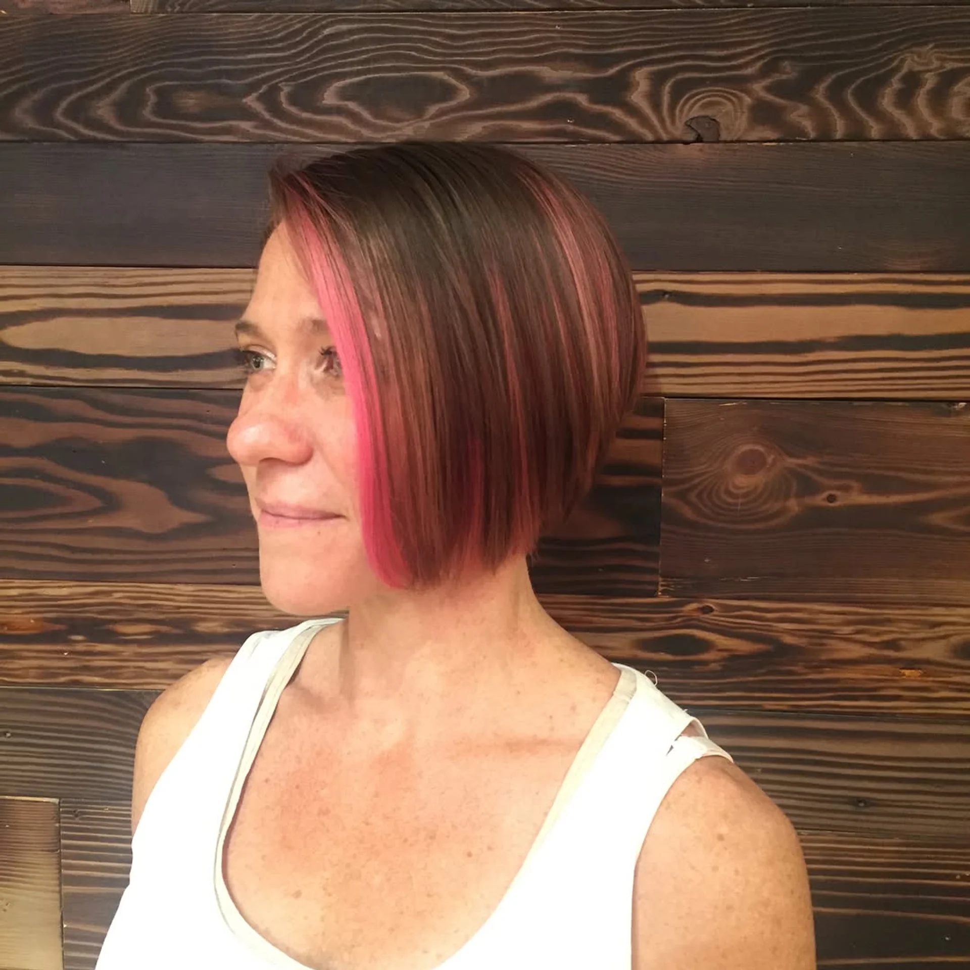 Sleek black bob with subtle peekaboo silver highlights, perfect for a professional tech environment. - Preview 2