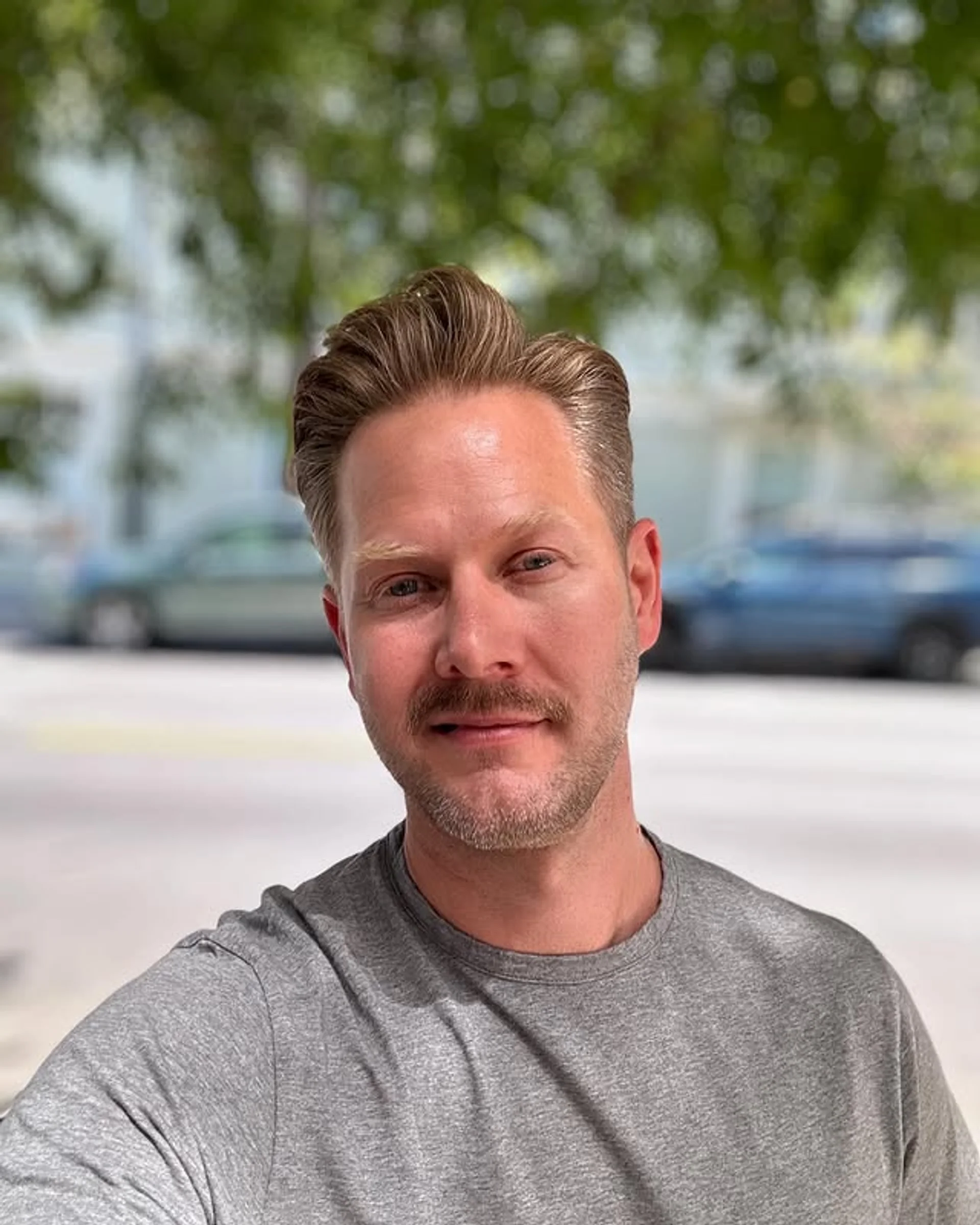 A modern textured pompadour fade with clean sides and voluminous top - Preview 1