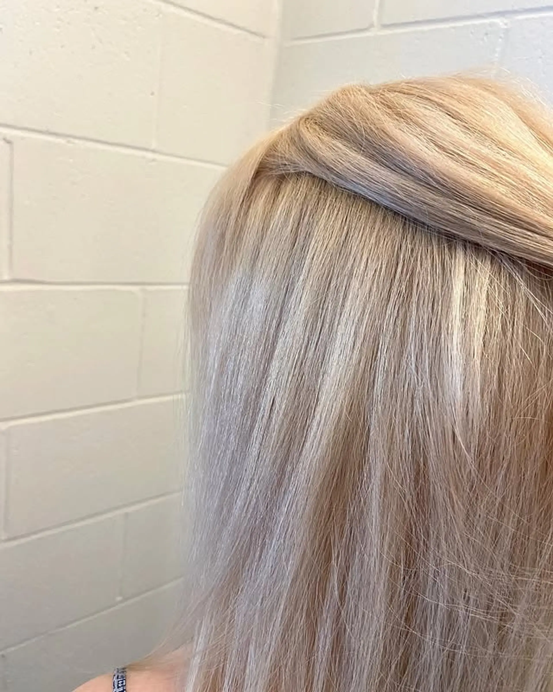 Long straight hair with an icy blonde balayage. 1
