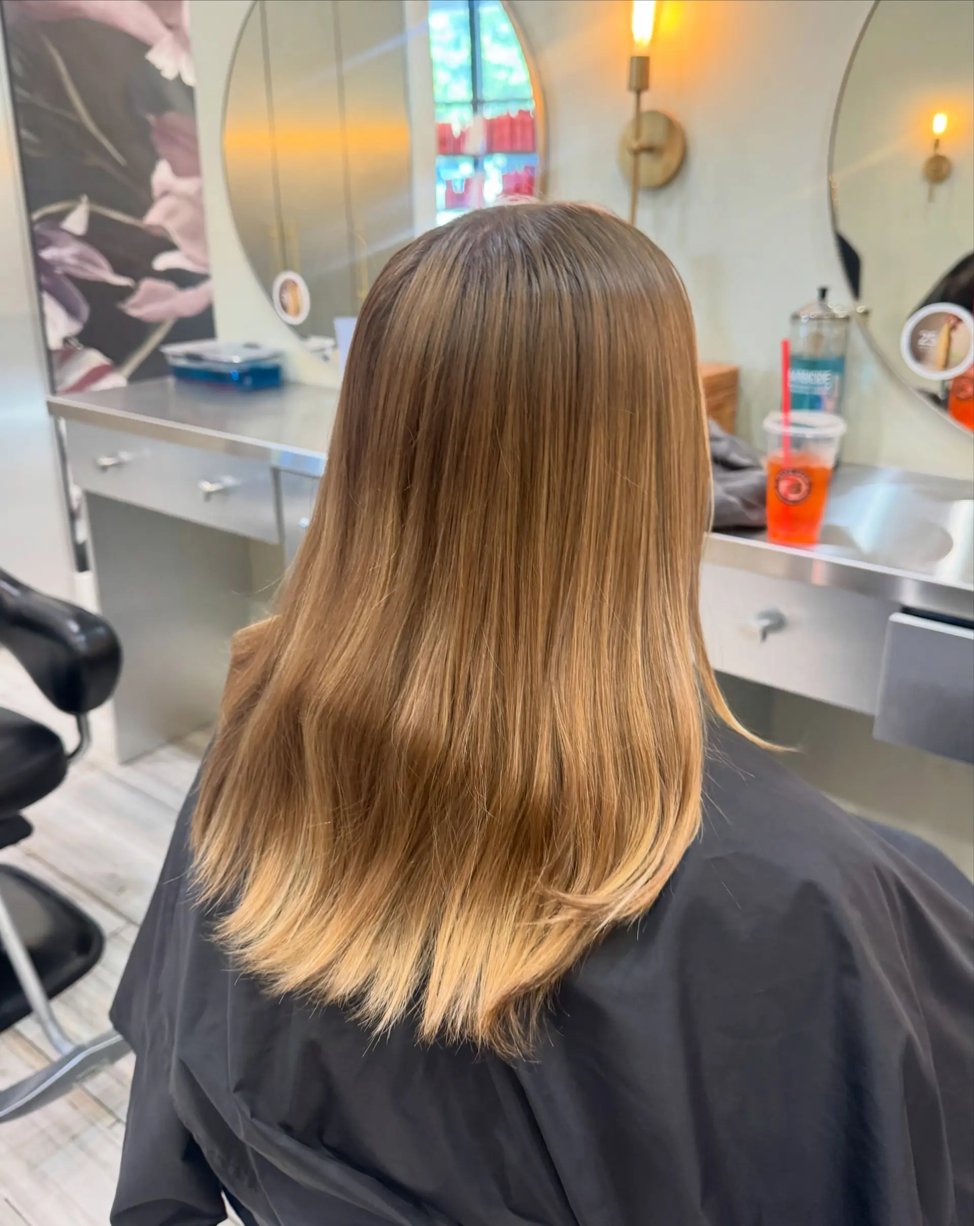 Medium-length straight hair styled smooth with warm vanilla blonde highlights blending seamlessly into lighter ends. 1