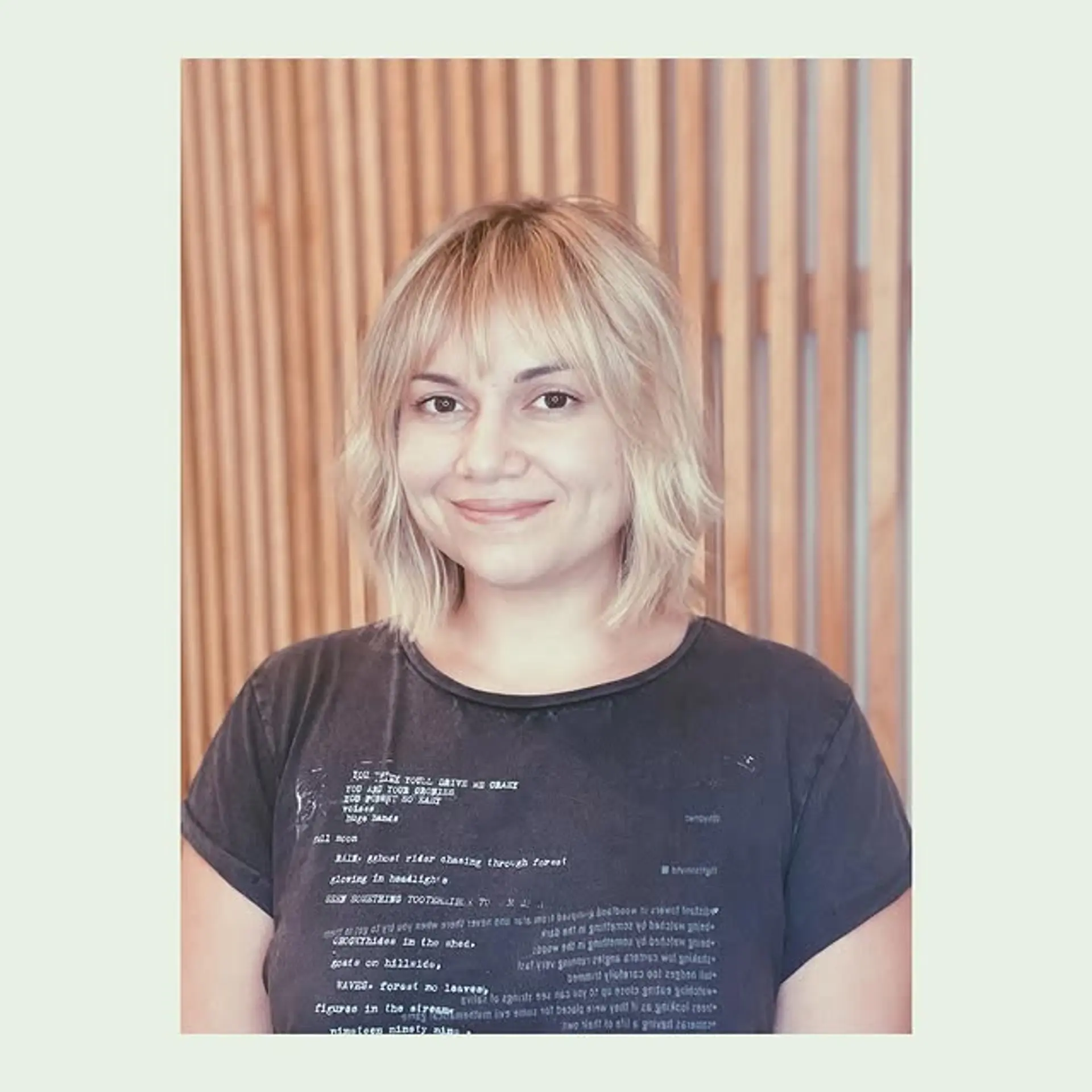 A textured, shoulder-length bob with bangs, creating a modern shaggy look. 1