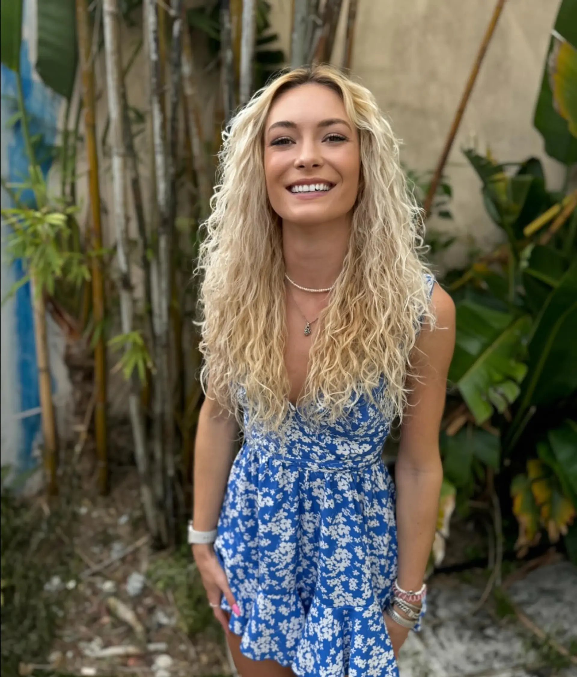 Long, voluminous blonde curls with a relaxed, boho style. 1