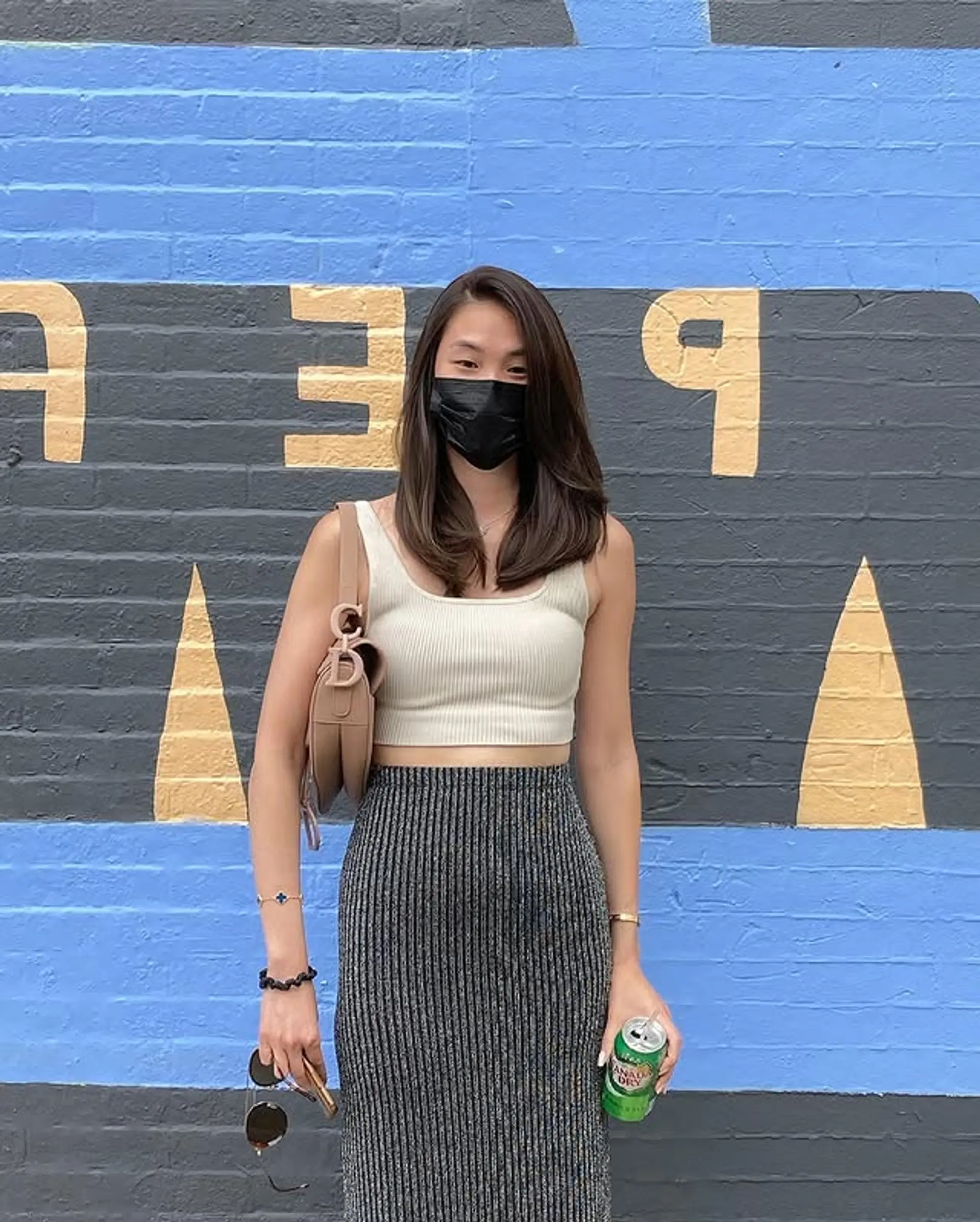 A medium-length layered haircut with soft, face-framing layers. 1