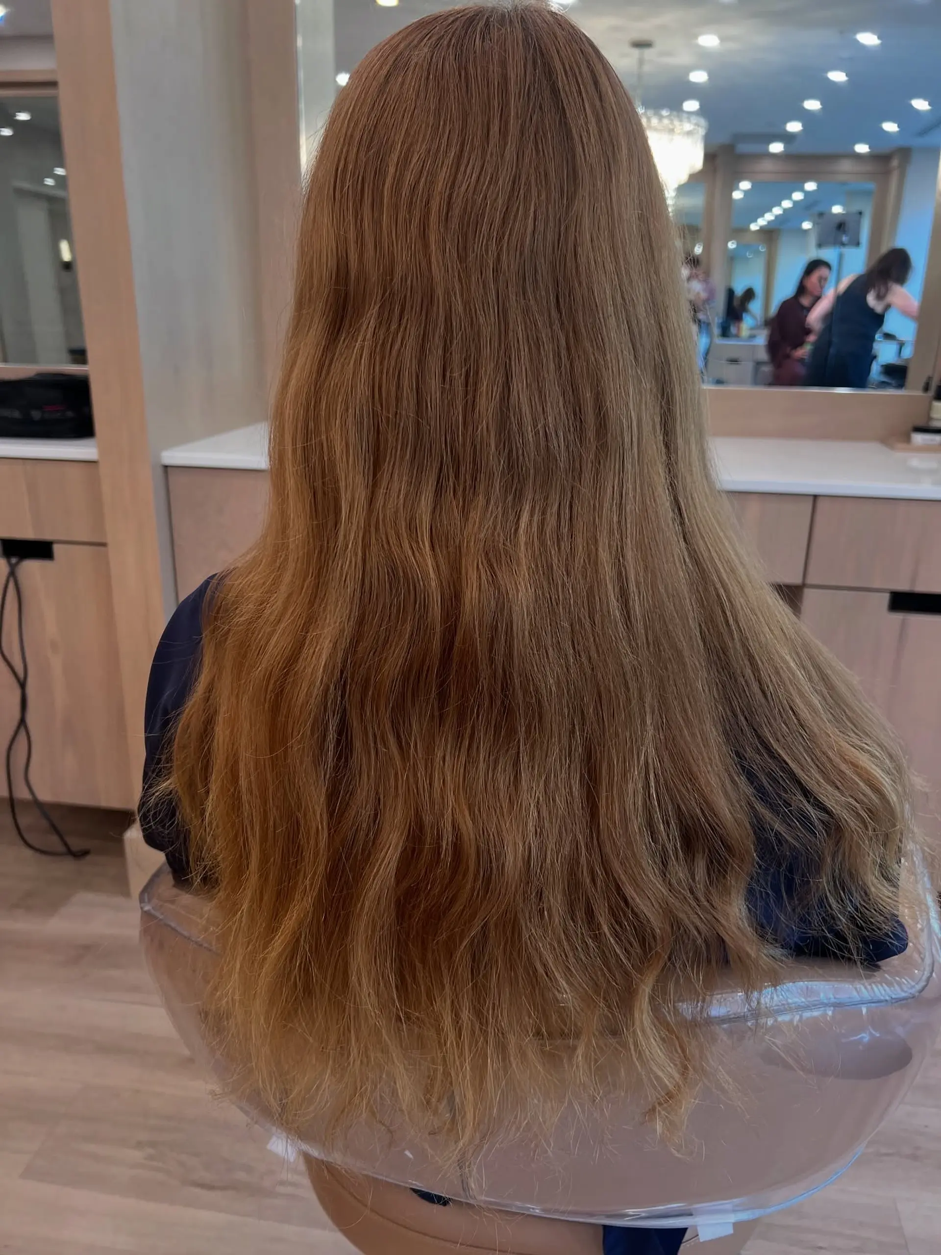 A short, layered bob with trendy curtain bangs. 2