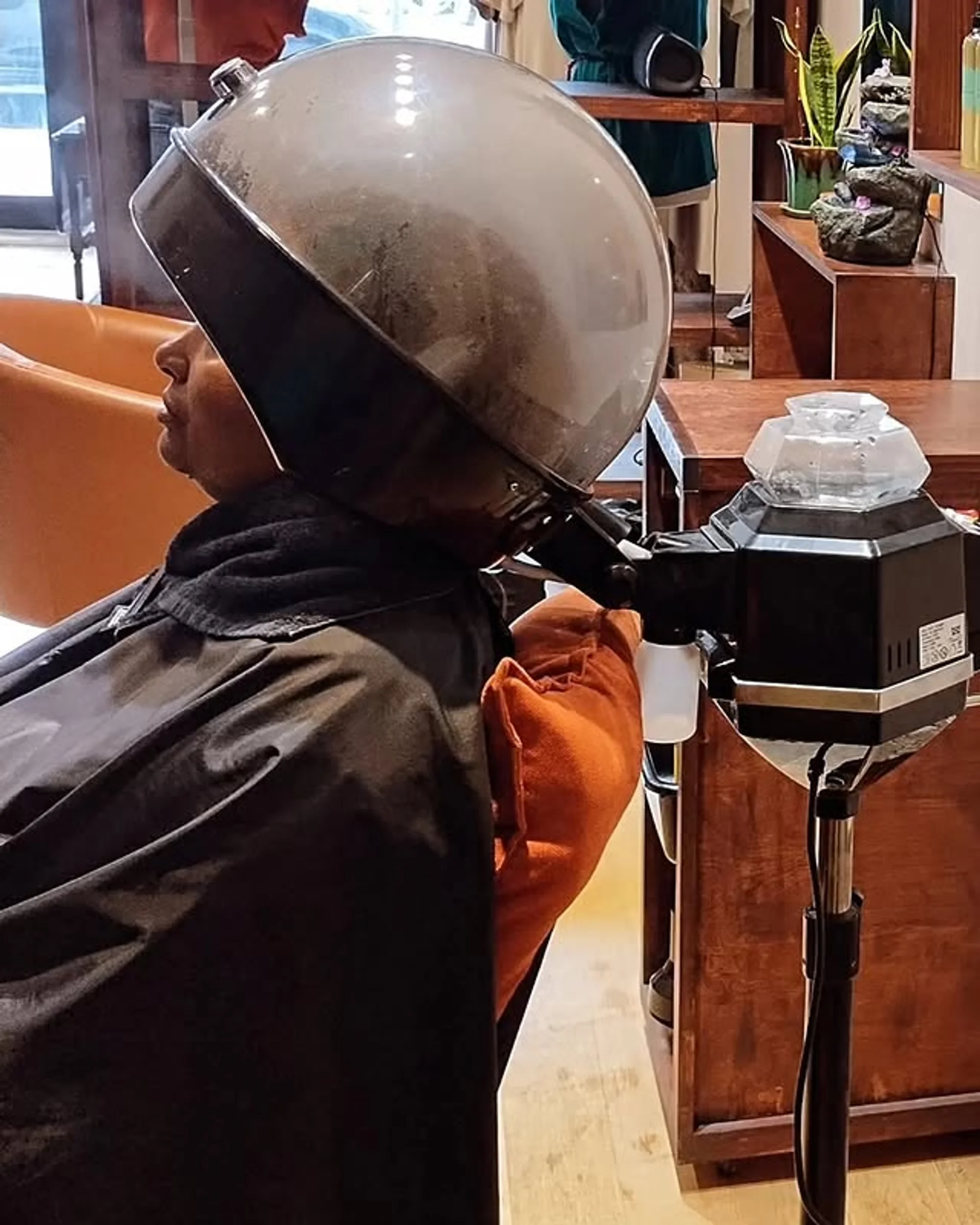 A model with extremely long, straight, glossy brown hair, showcasing the 2026 glass hair trend focused on health and longevity. - Preview 1