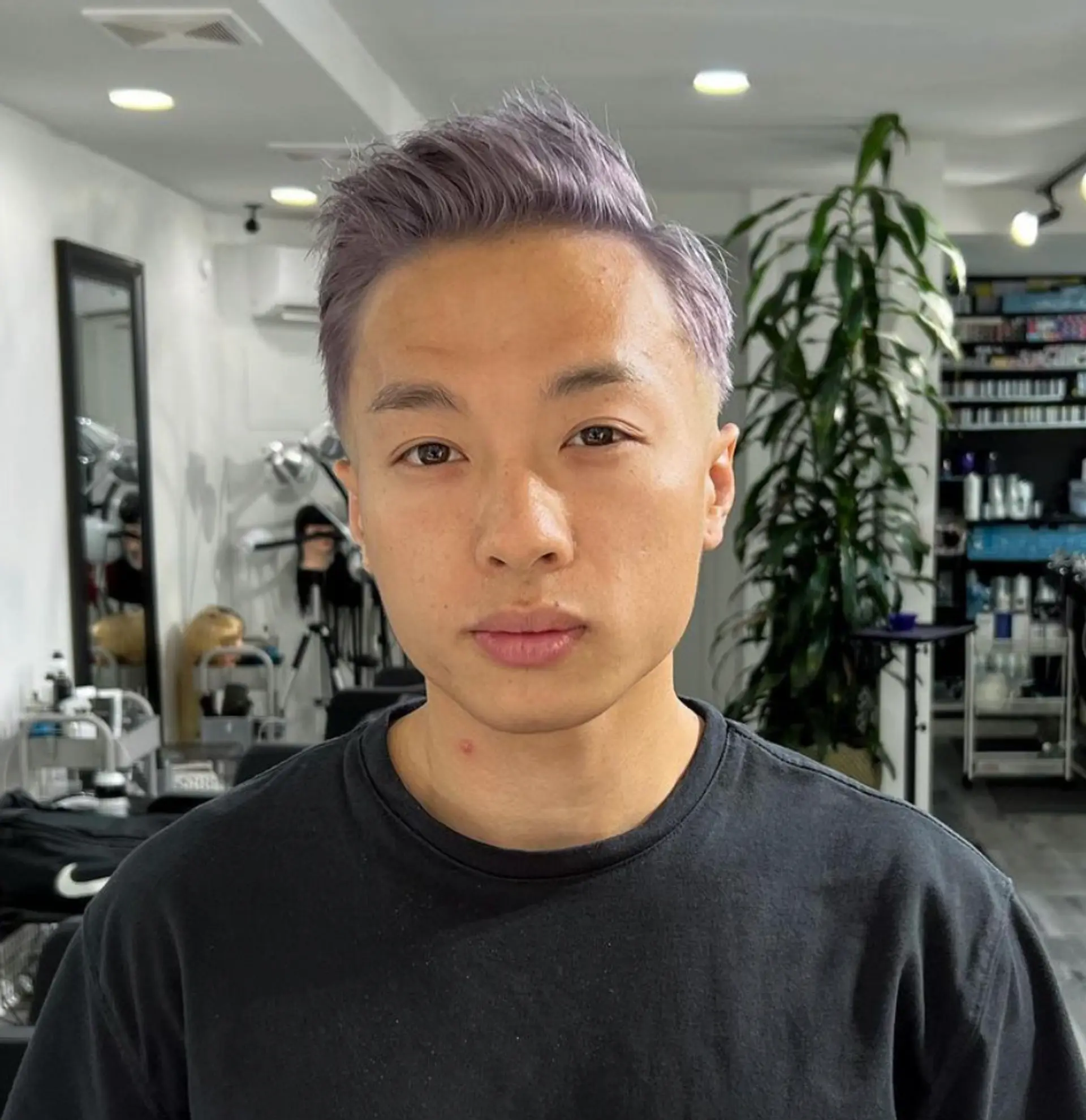 High fade with a textured top, lavender and silver hues, modern and stylish. 2