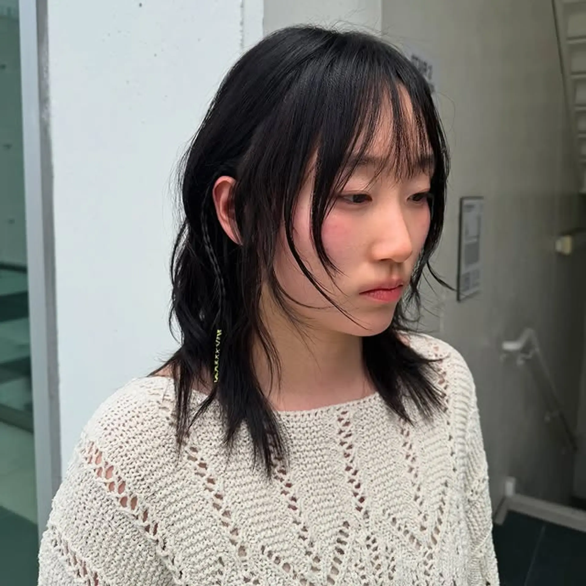 A modern shag haircut with choppy layers and flattering curtain bangs. 1