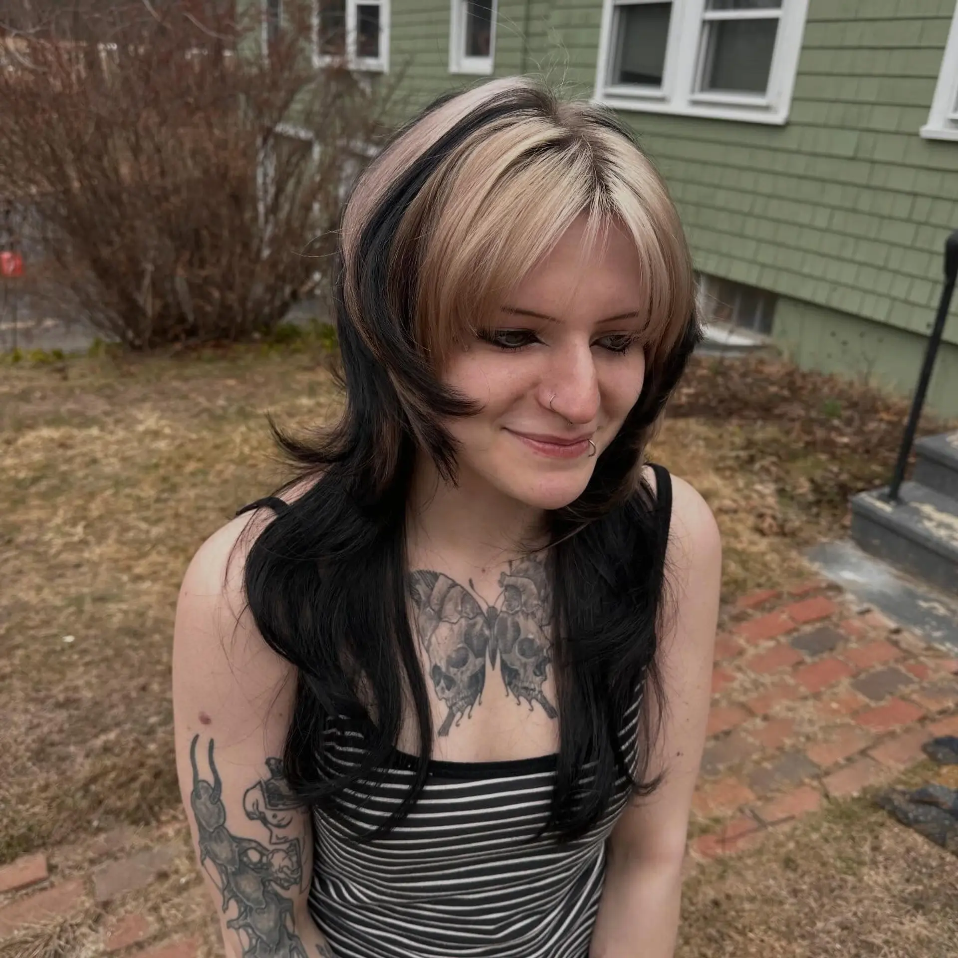 A distinctive two-tone jellyfish haircut featuring a rounded bob layer with wispy bangs and long lengths underneath. 1