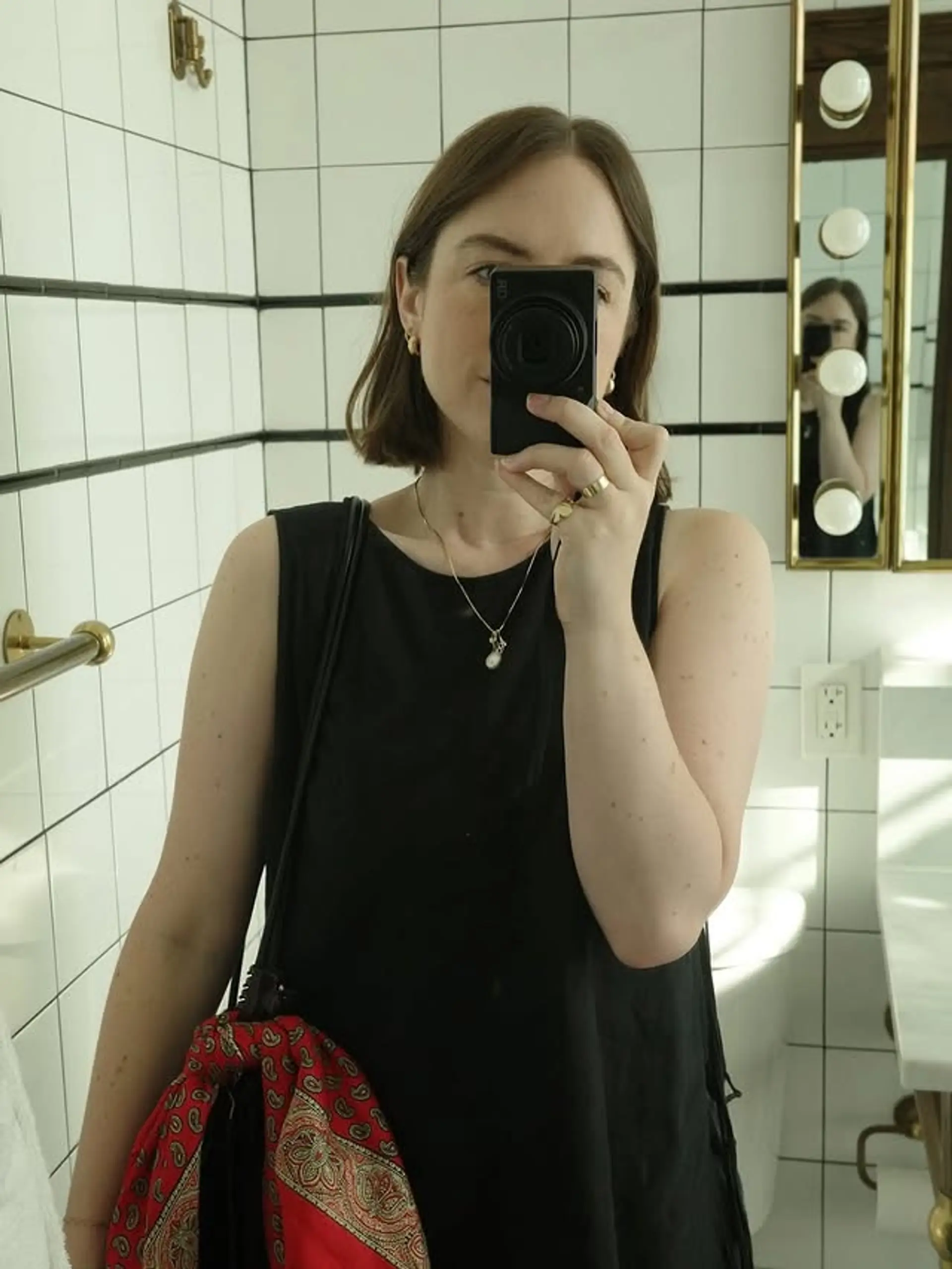 A chin-length blunt bob with a straight texture. 1