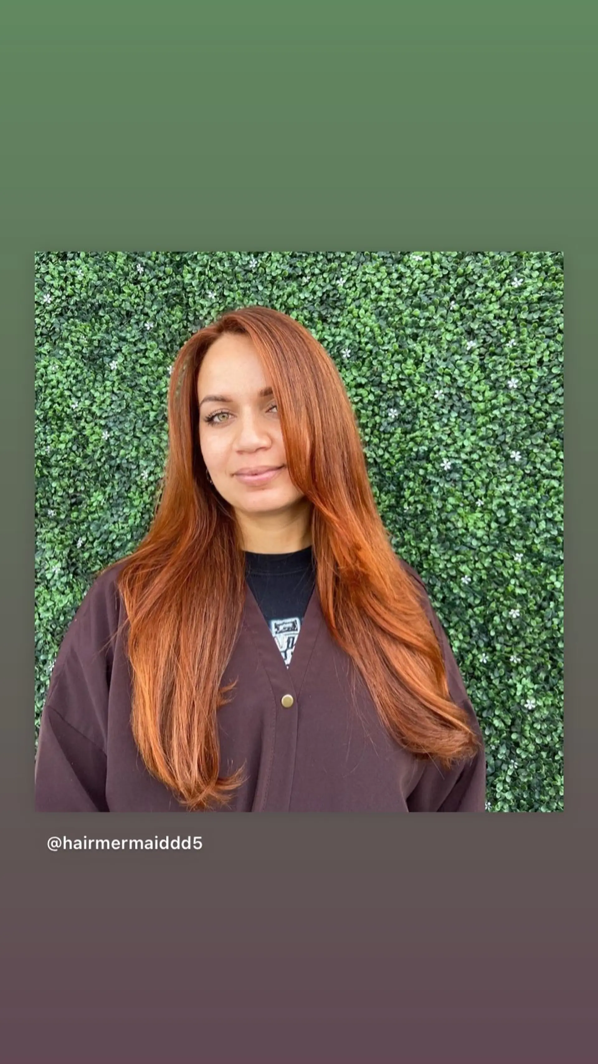 Long, layered hairstyle with face-framing layers. 1