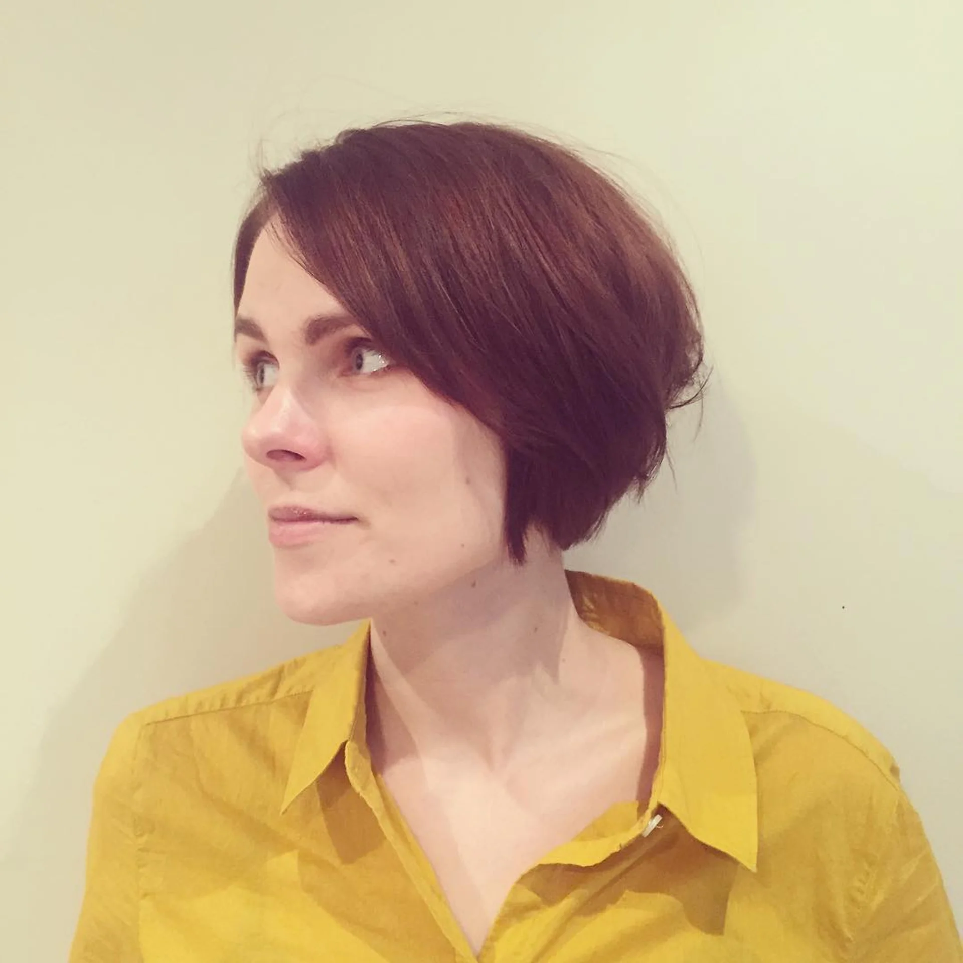 Sleek modern asymmetrical bob haircut with precise lines, embodying a contemporary trend. - Preview 3