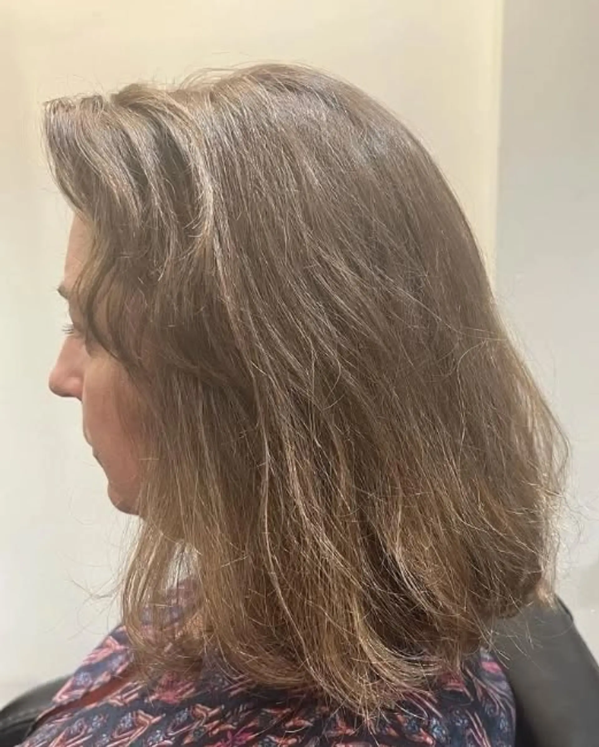A bronde layered bob that sits at medium length. 1