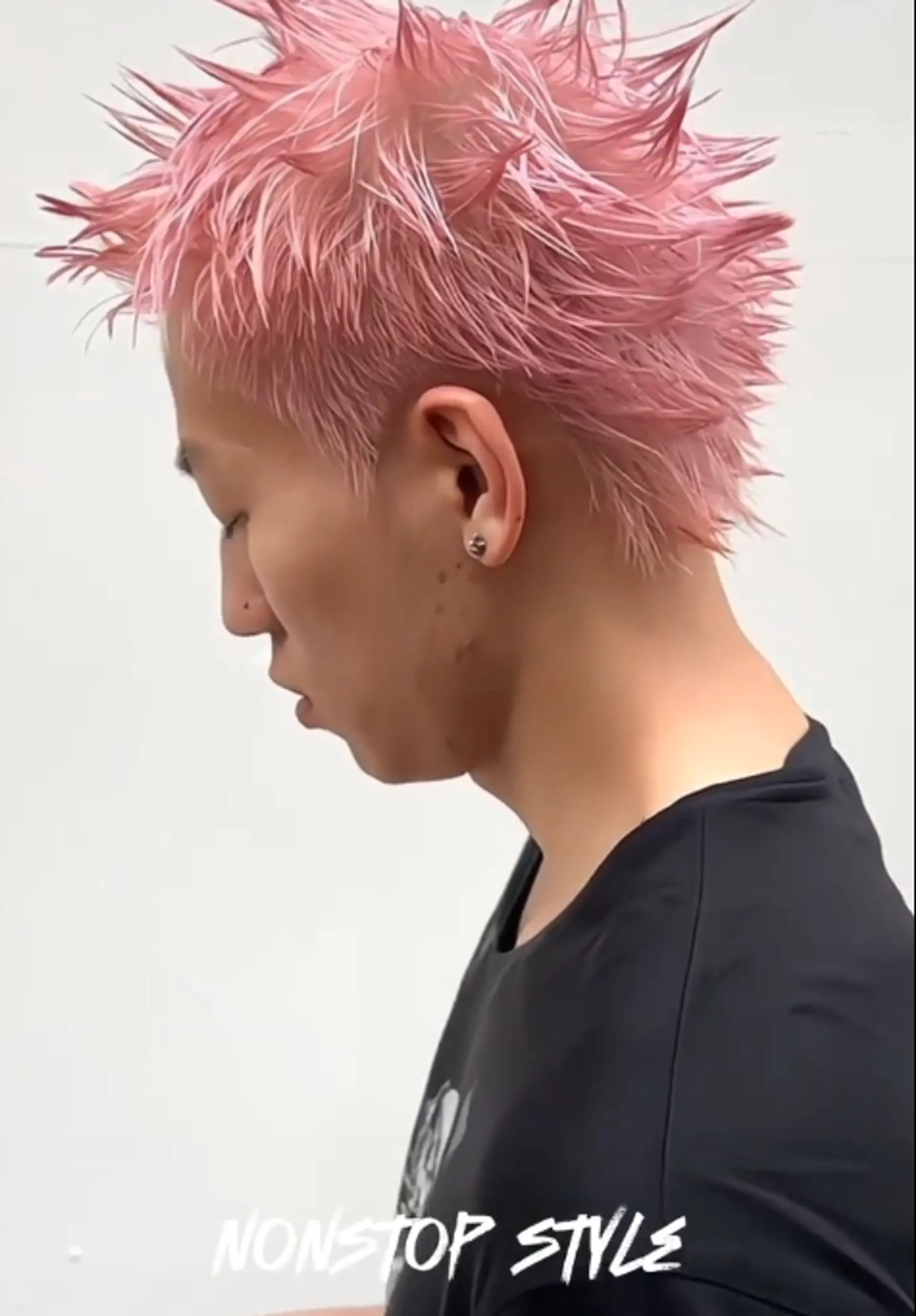 Short, straight hair dyed a vibrant pink and styled into sharp, edgy spikes radiating from the head.
(NonstopStyle: by Vincent) 1