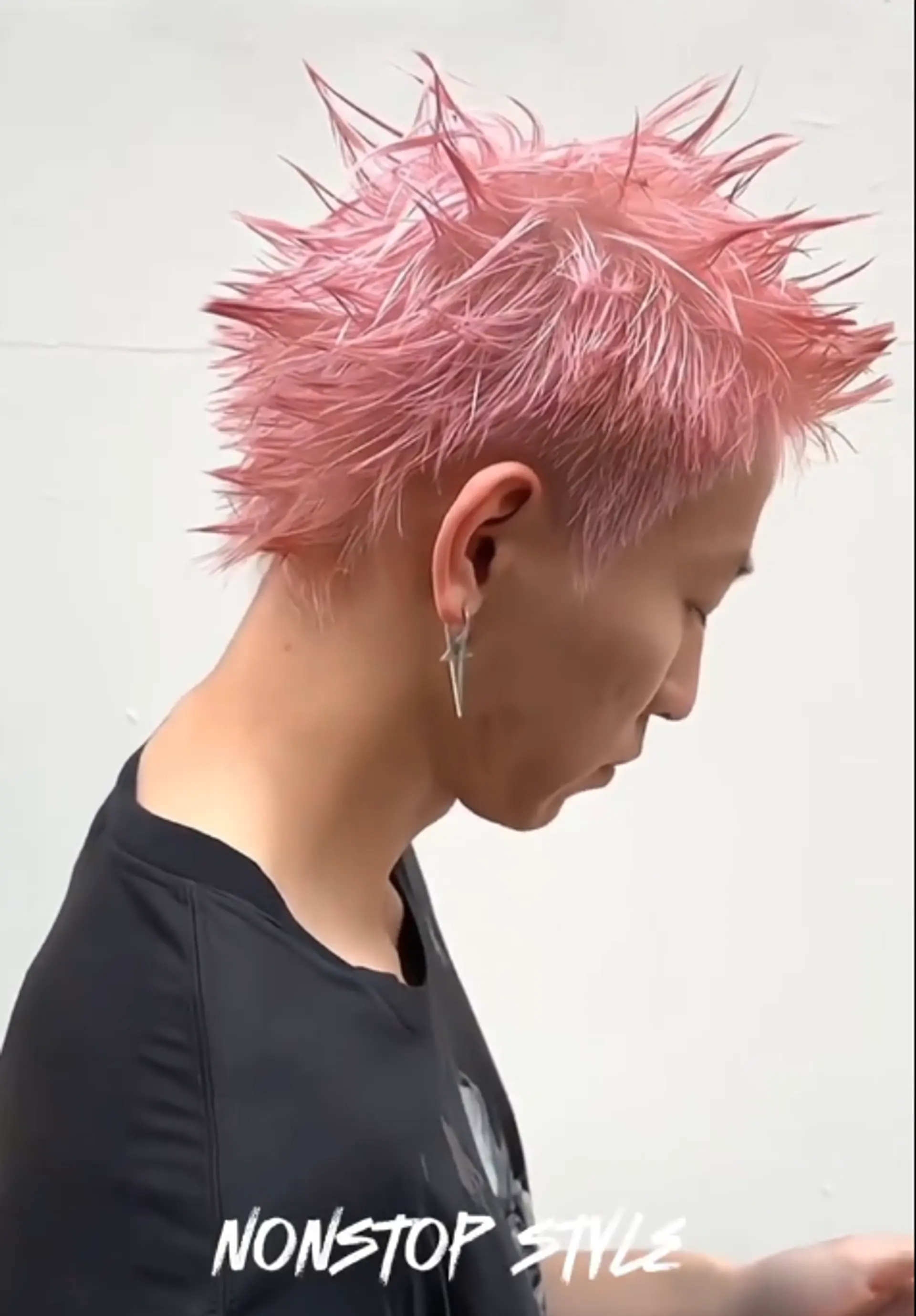 Short, straight hair dyed a vibrant pink and styled into sharp, edgy spikes radiating from the head.
(NonstopStyle: by Vincent) 2
