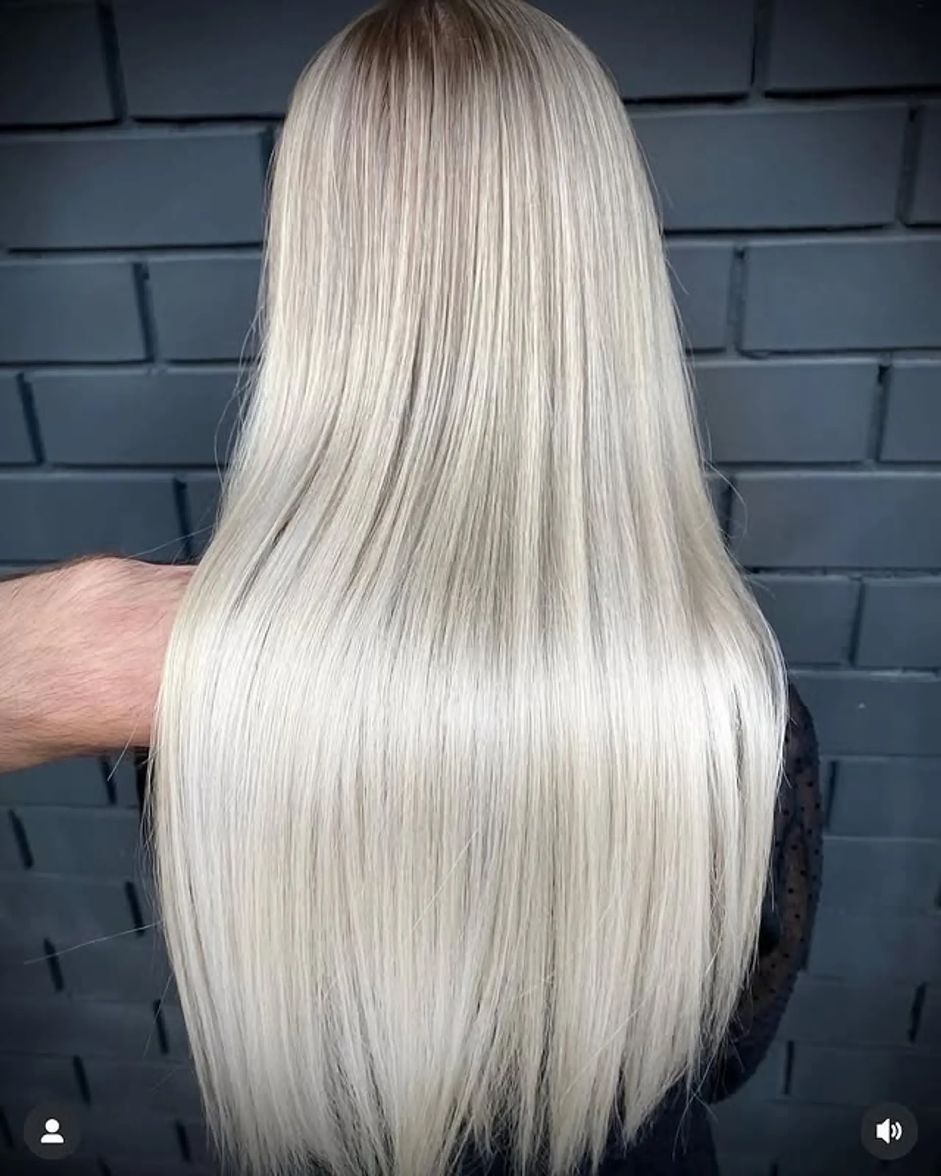 Long, straight hair with an icy ash blonde balayage. 1