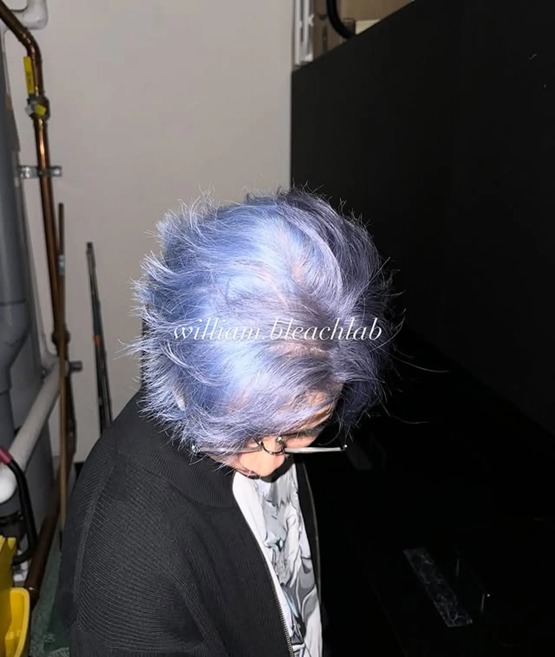 A contemporary short, spiky shag haircut with textured layers that create volume and movement, styled to look effortlessly edgy and playful. 1