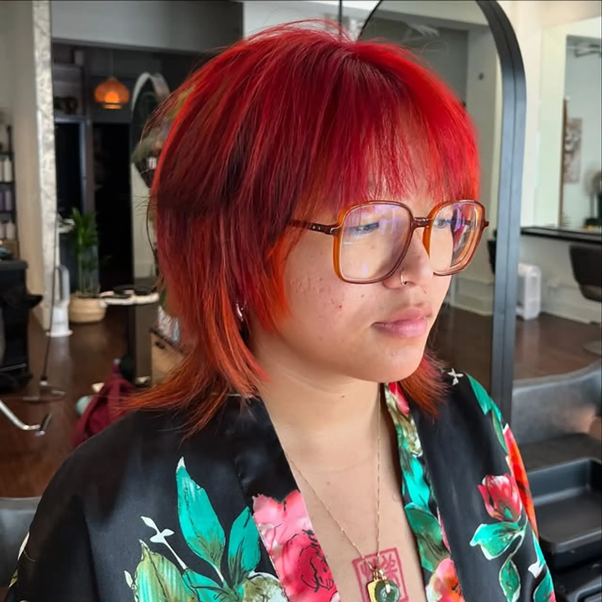 A modern shag haircut with layered texture and choppy bangs. 1