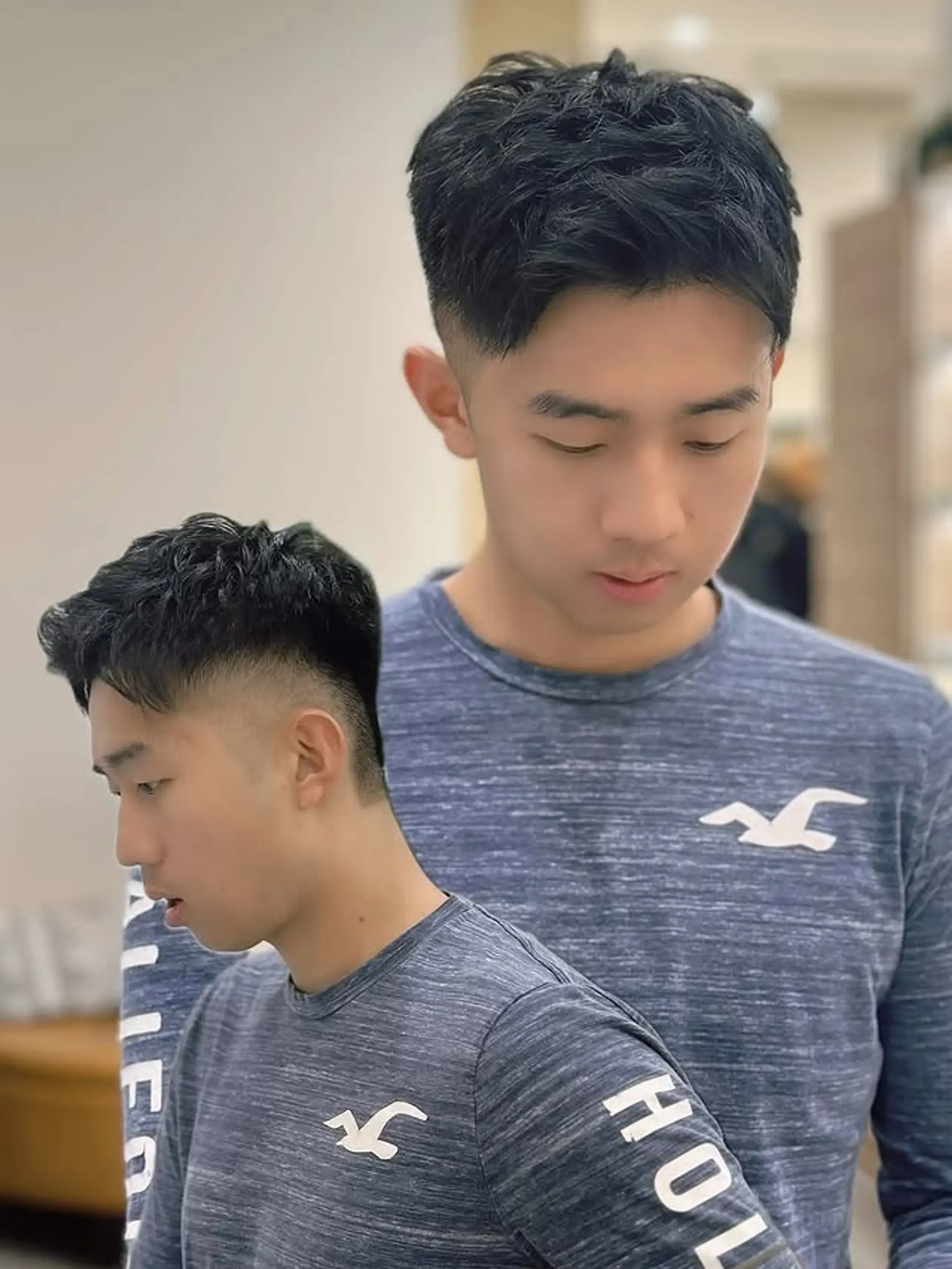 A short, textured crop with a skin fade. The top is styled with a textured finish. 1