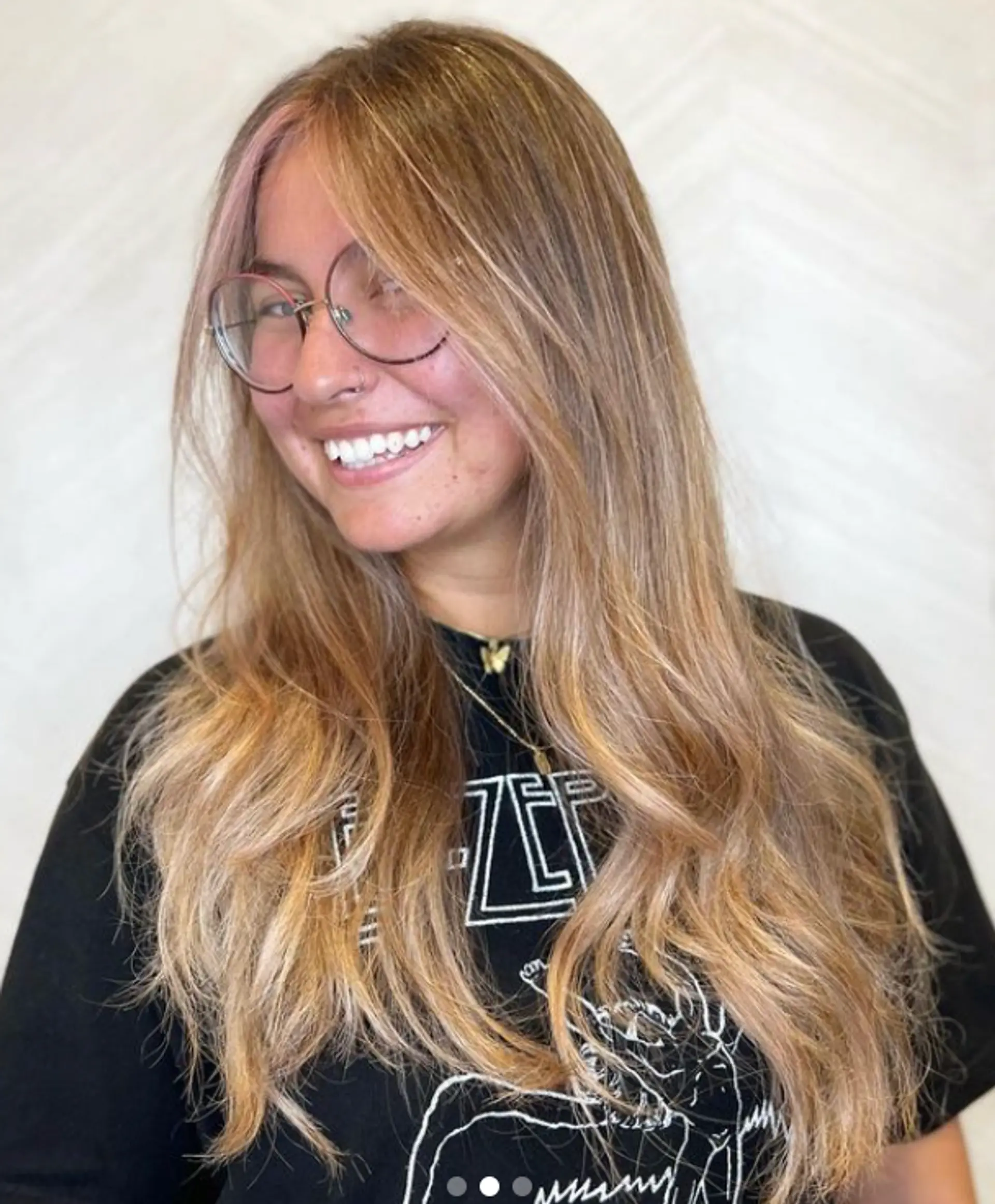 Long, wavy locks with light and dark blonde colors, natural roots, and face-framing highlights. 1