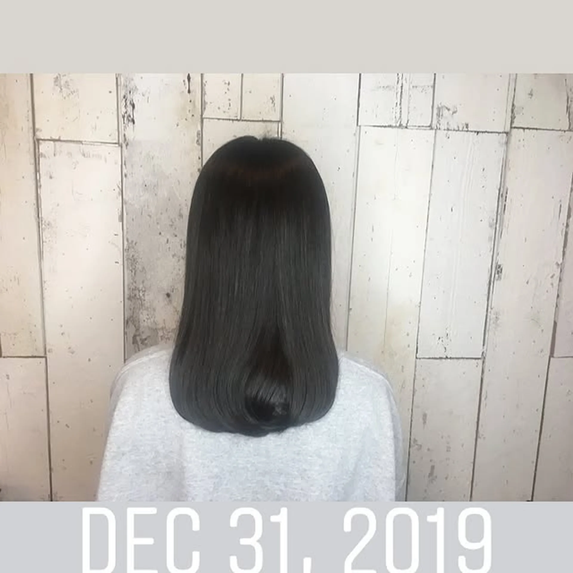 Sleek blunt bob cut to chin length, embodying a powerful office look. - Preview 1