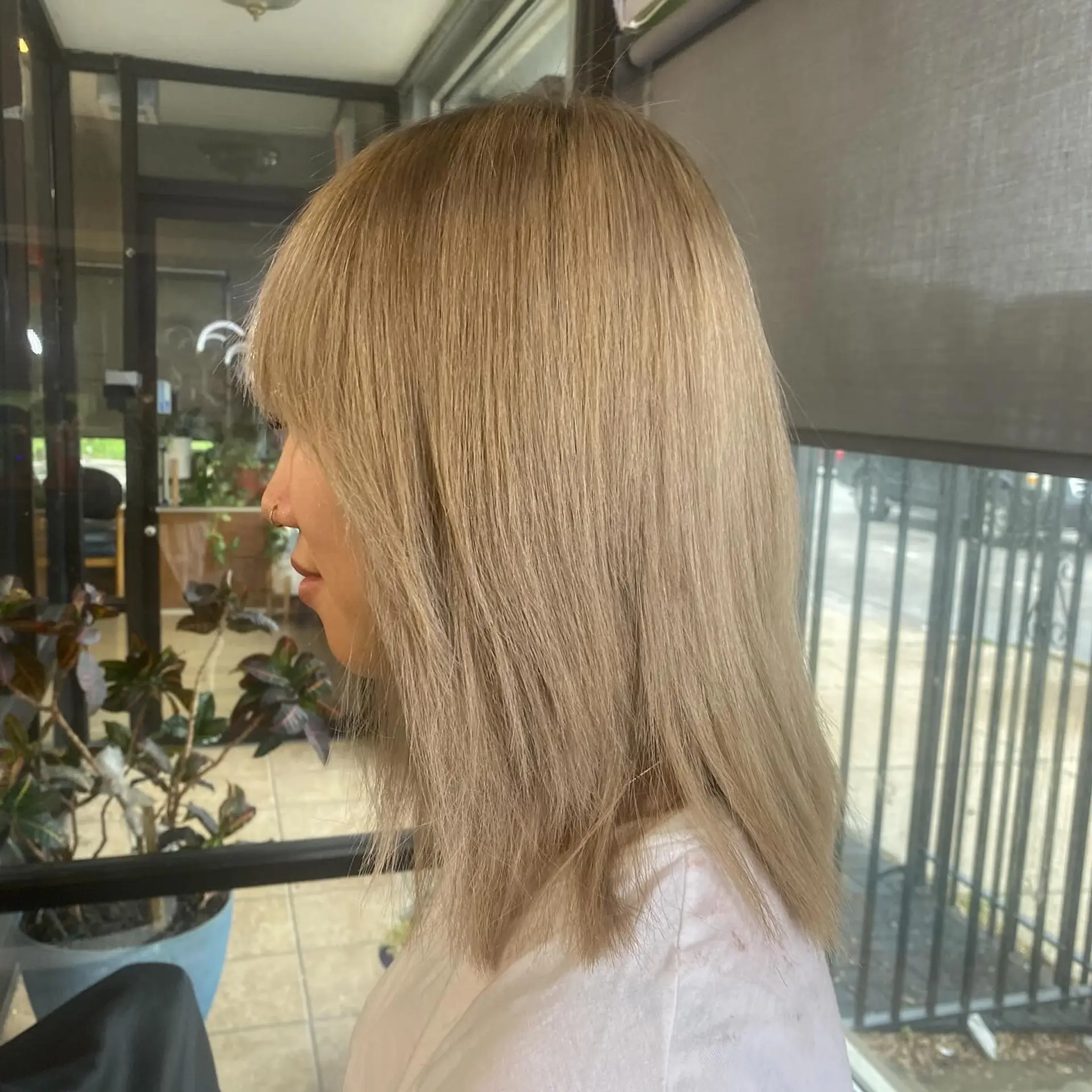 A shaggy lob with curtain bangs and lots of texture. 2