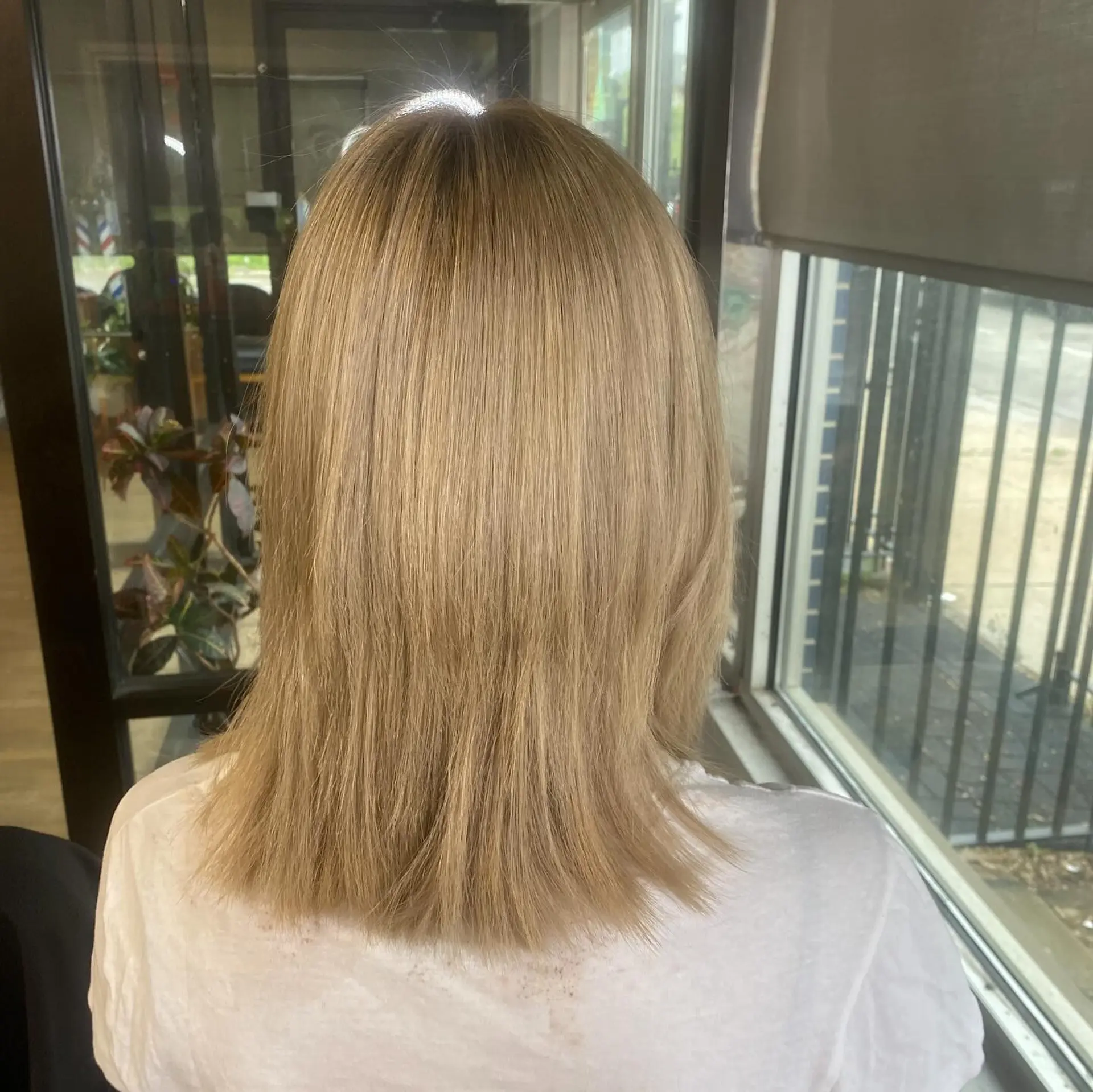 A shaggy lob with curtain bangs and lots of texture. 3