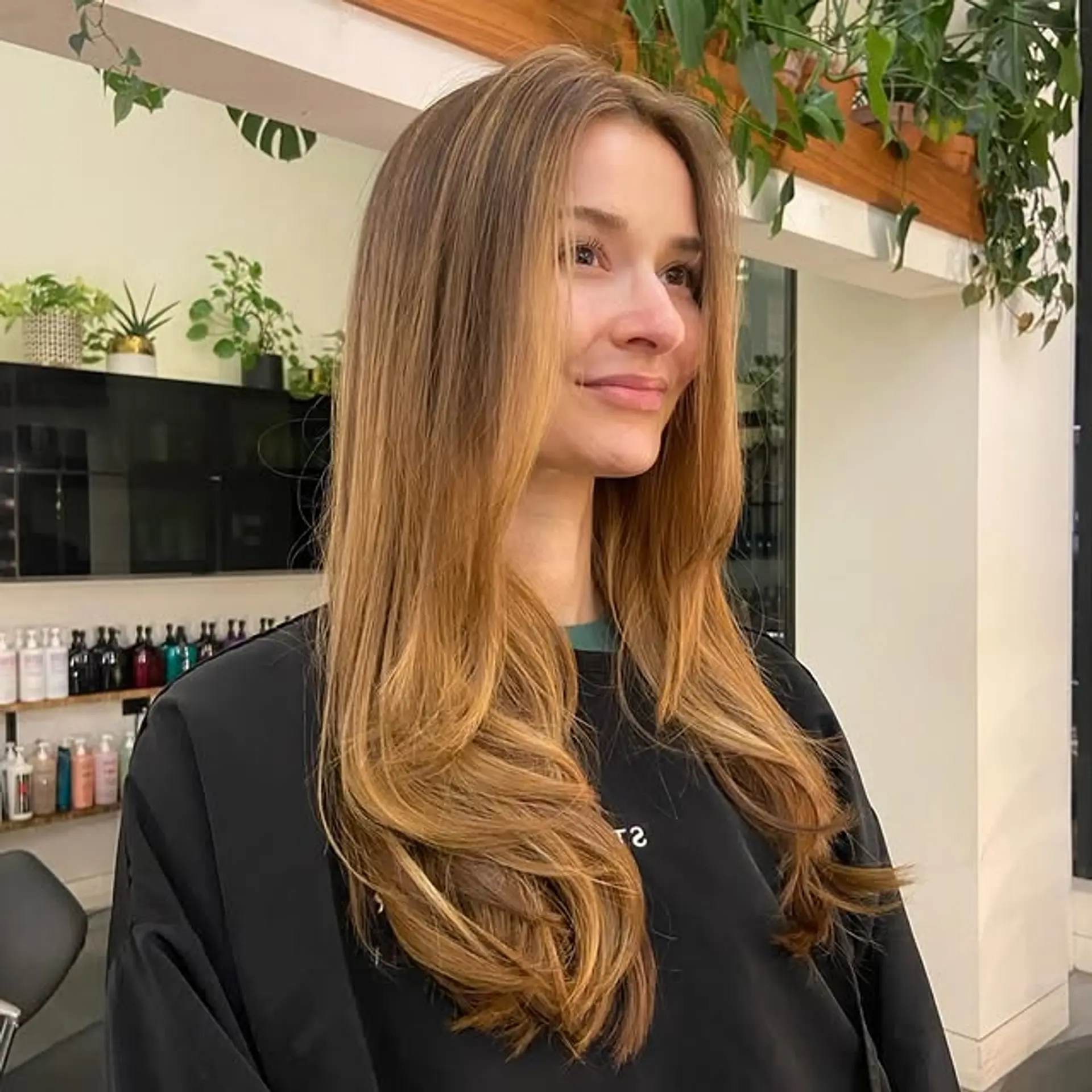 Long layered haircut with face-framing layers. 1