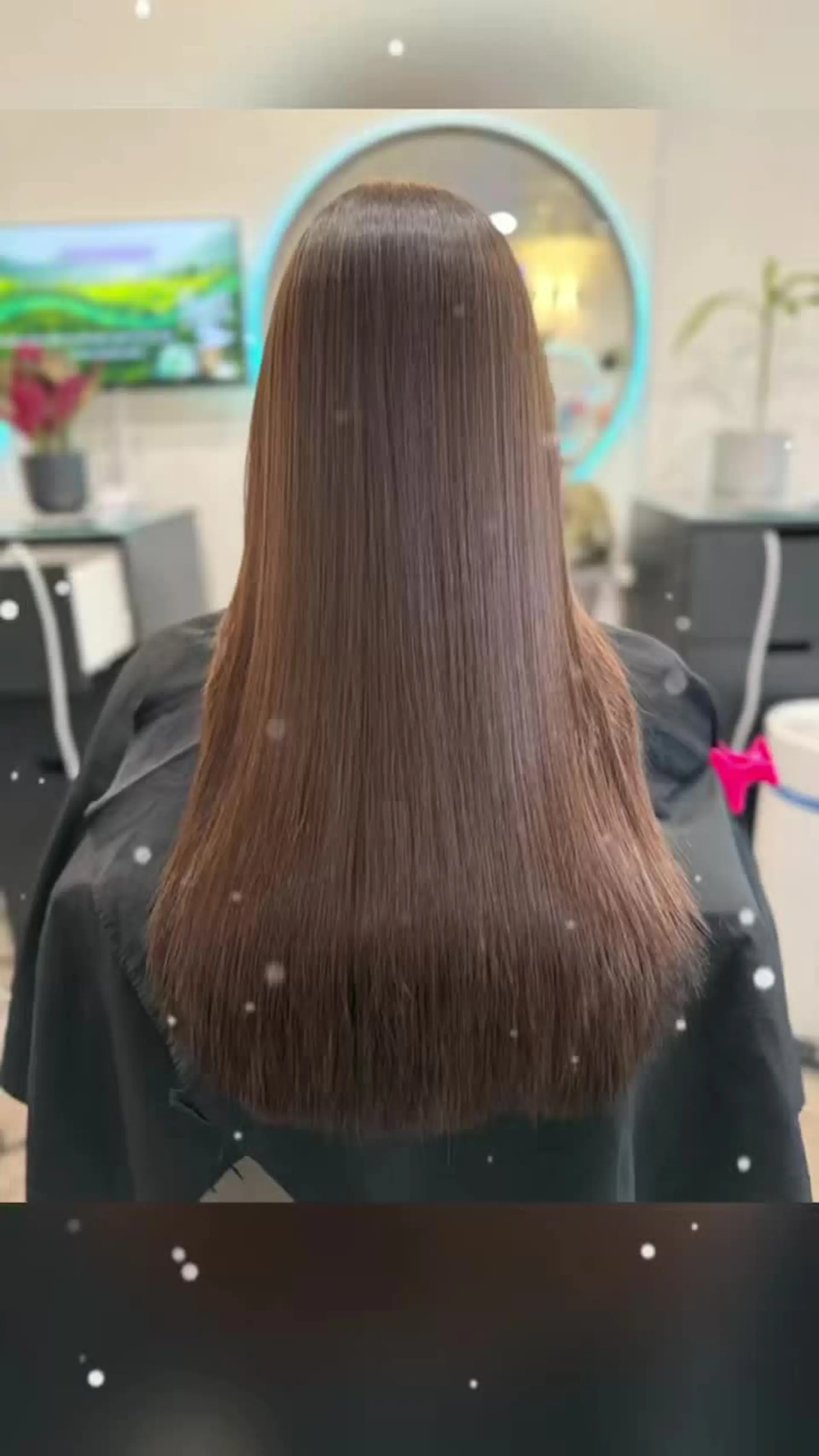 Ultra-sleek, pin-straight long brunette hair with a glossy, frizz-free finish and even ends. 1