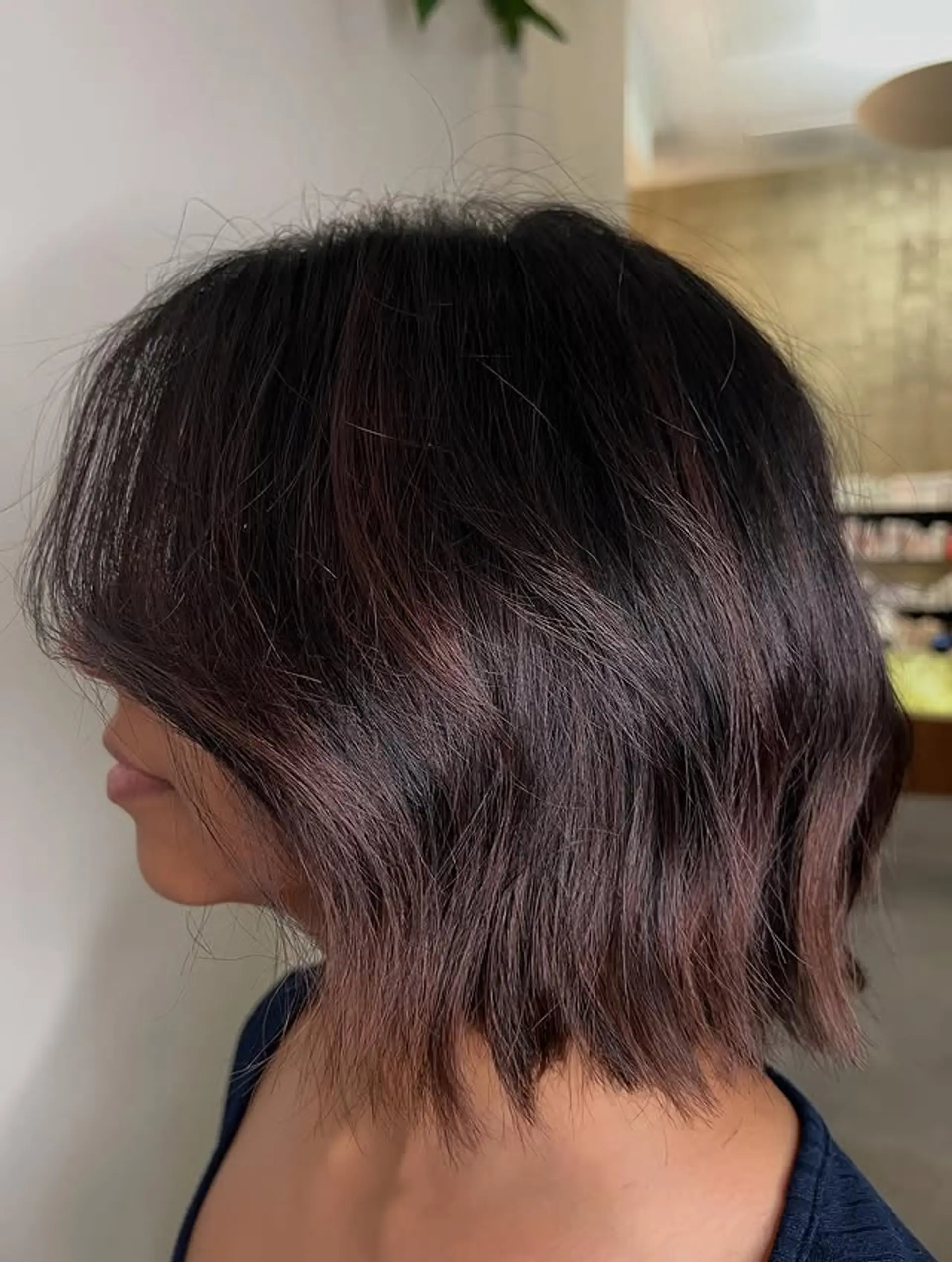 A wavy bob with curtain bangs. 1