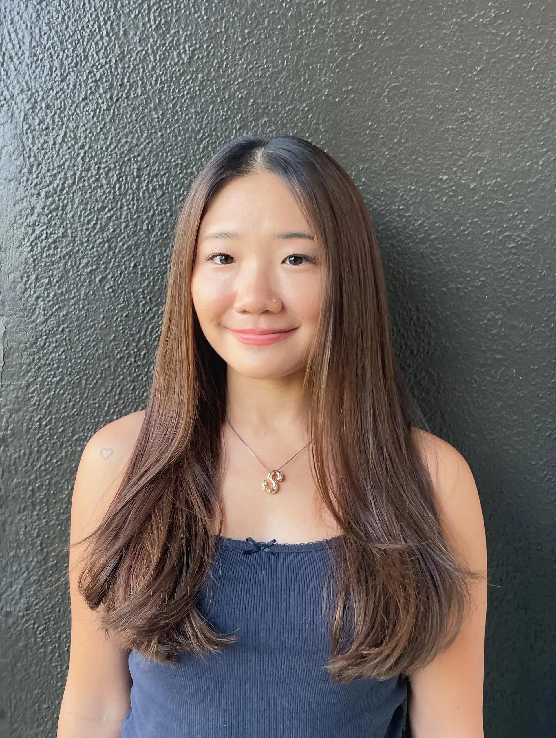 Long, layered hairstyle with a bronde balayage. 1