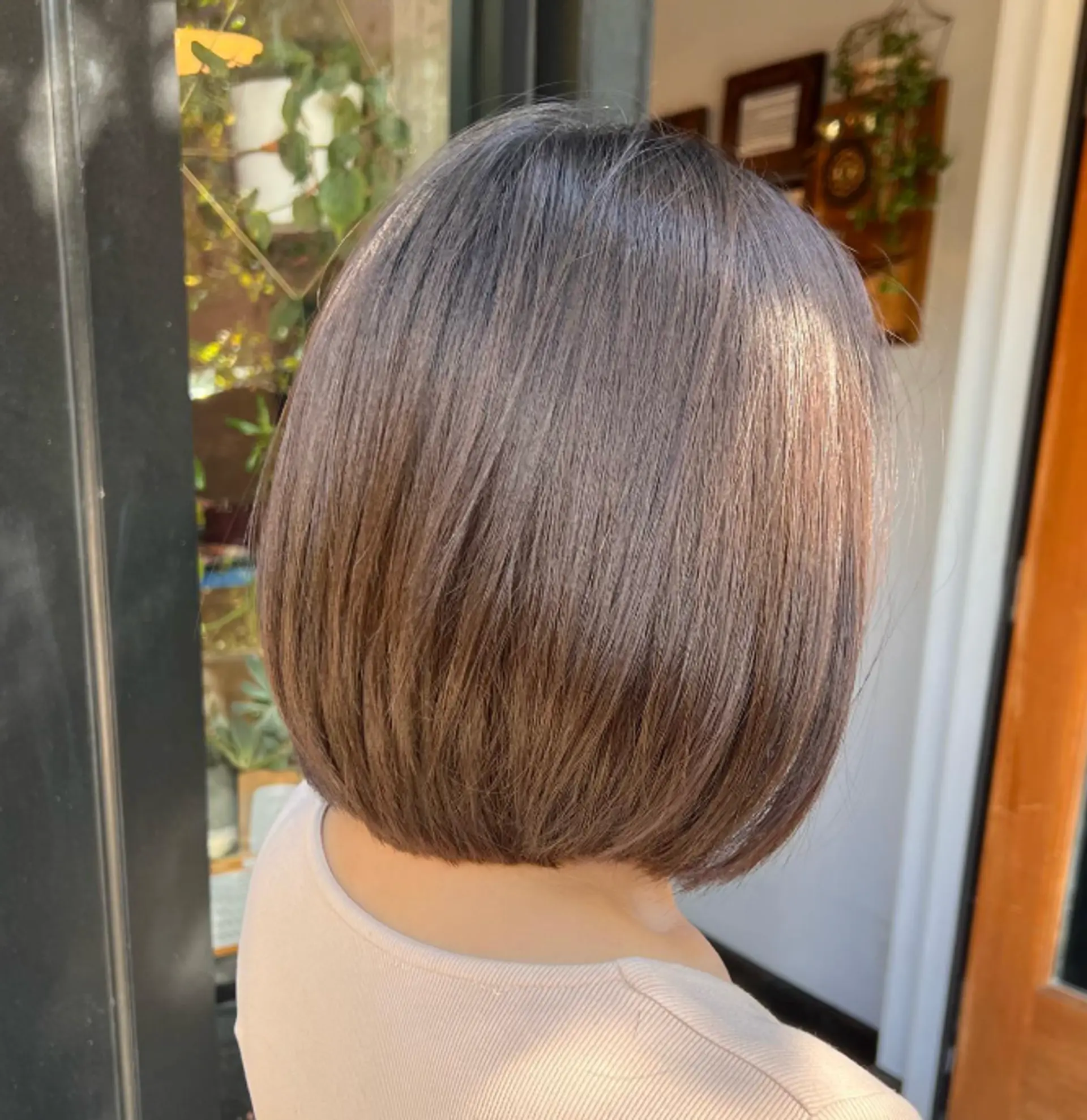 A sleek and straight blunt bob with a subtle ombre color melt. 1