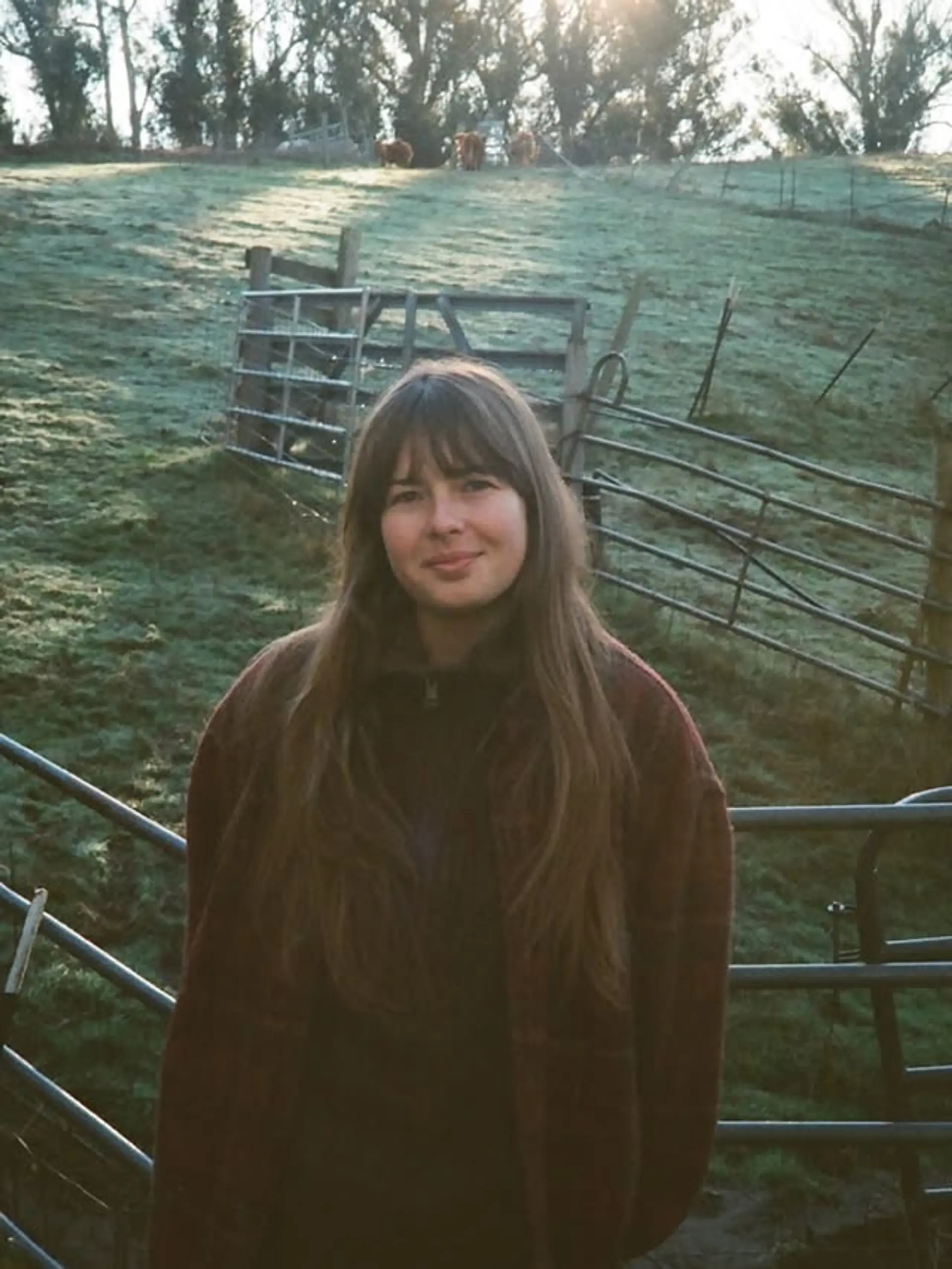 A long layered shag haircut with full bangs. 1