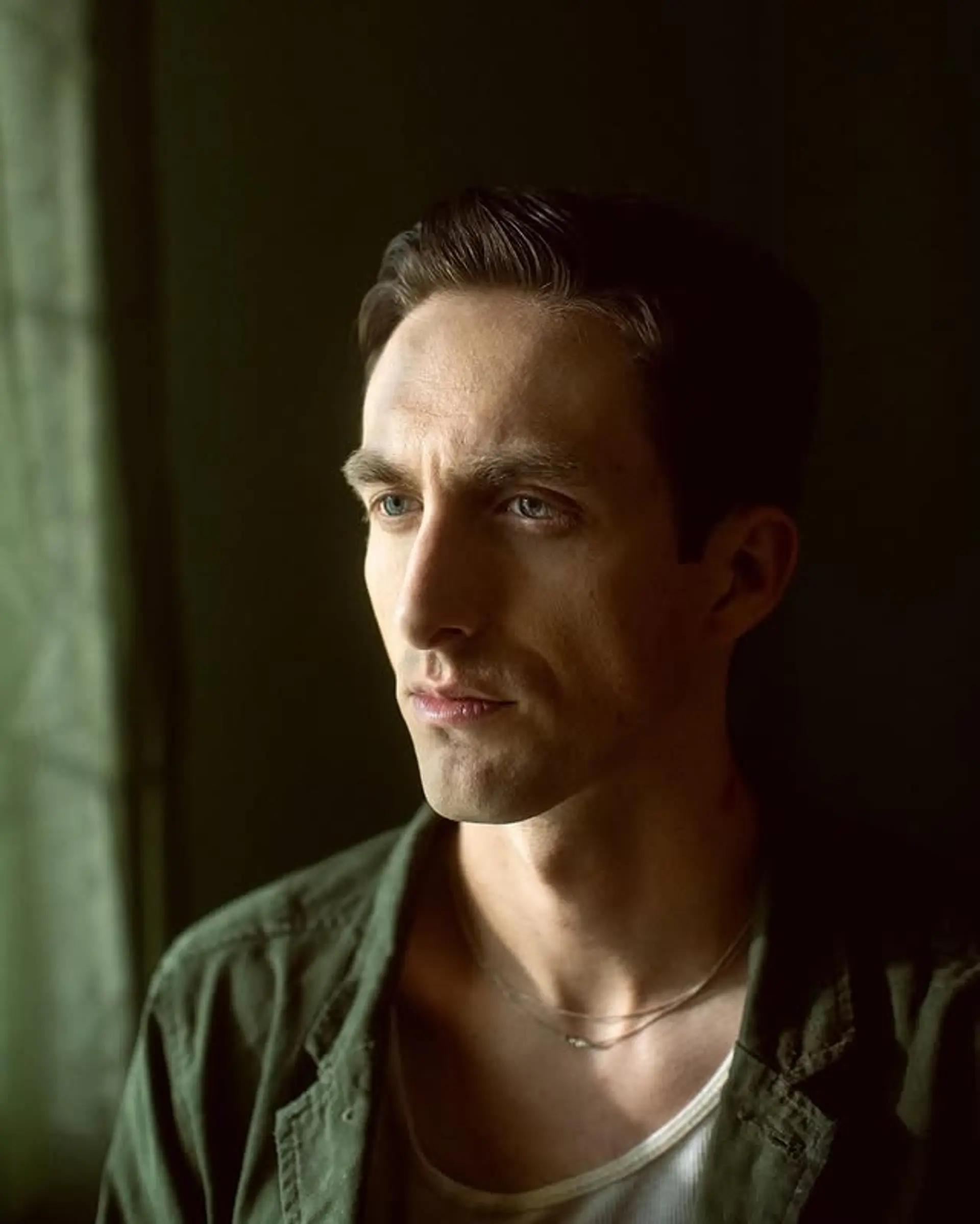 A classic short haircut with tapered sides and a neat side part. 1