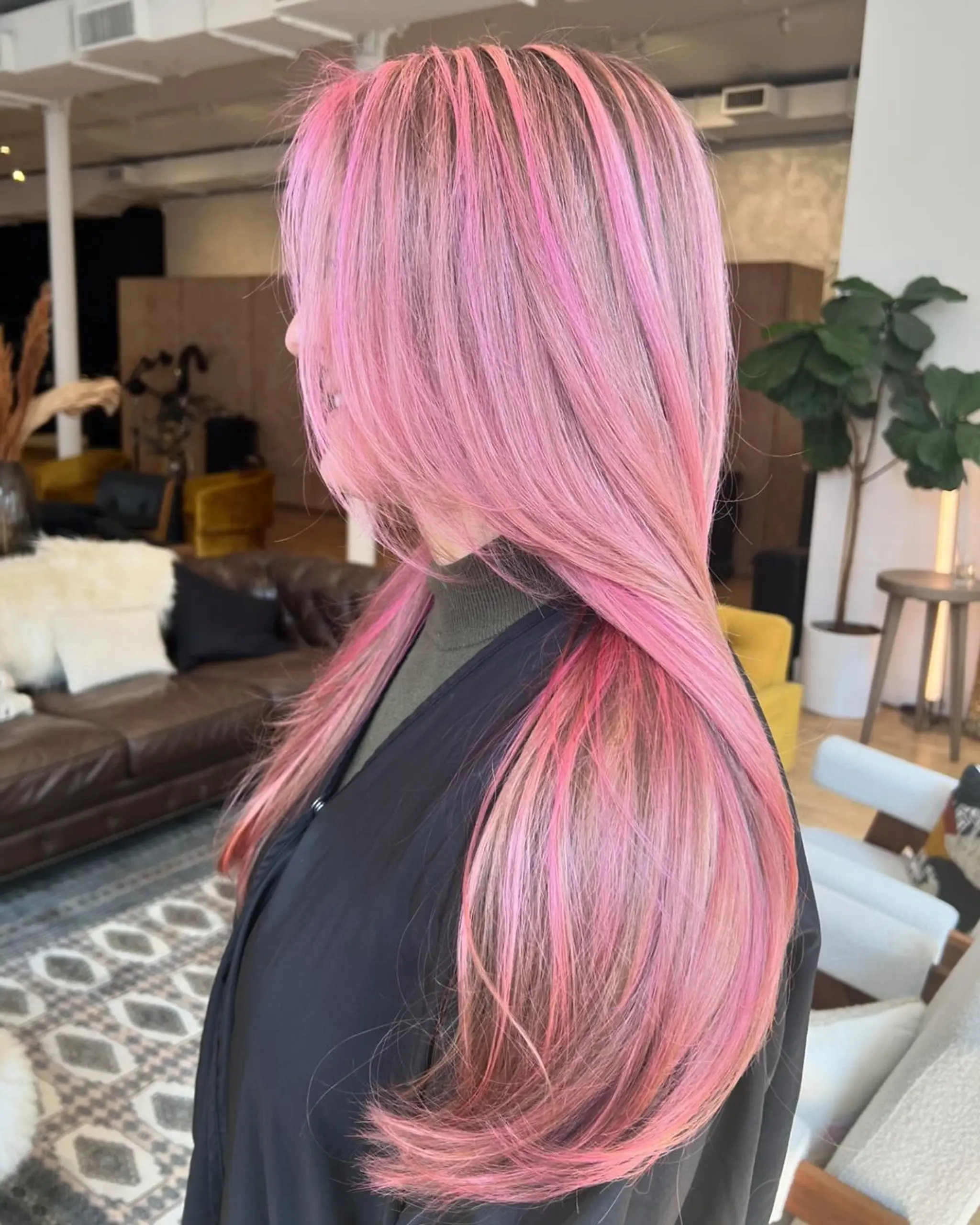Long, straight hairstyle with pink, rose gold, and blonde highlights, featuring sleek, layered strands.

Stylist: @danieldoeshair