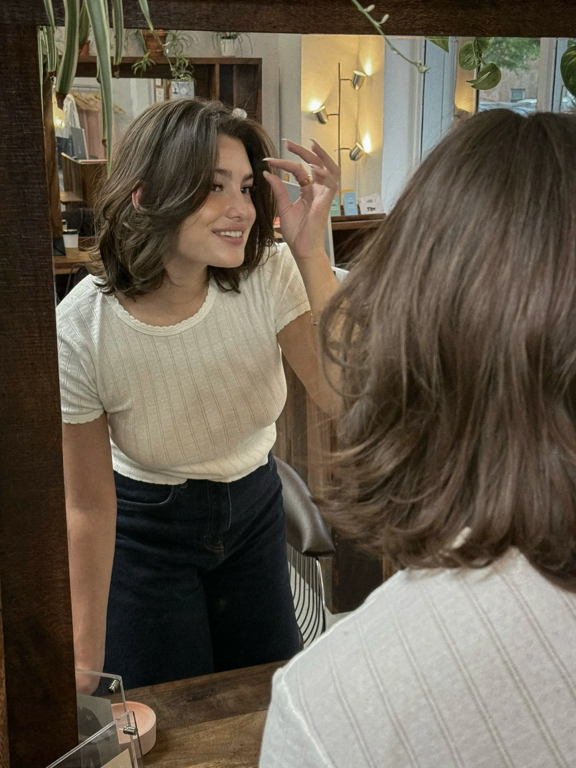 A trendy shag haircut with face-framing layers and soft curtain bangs. 1