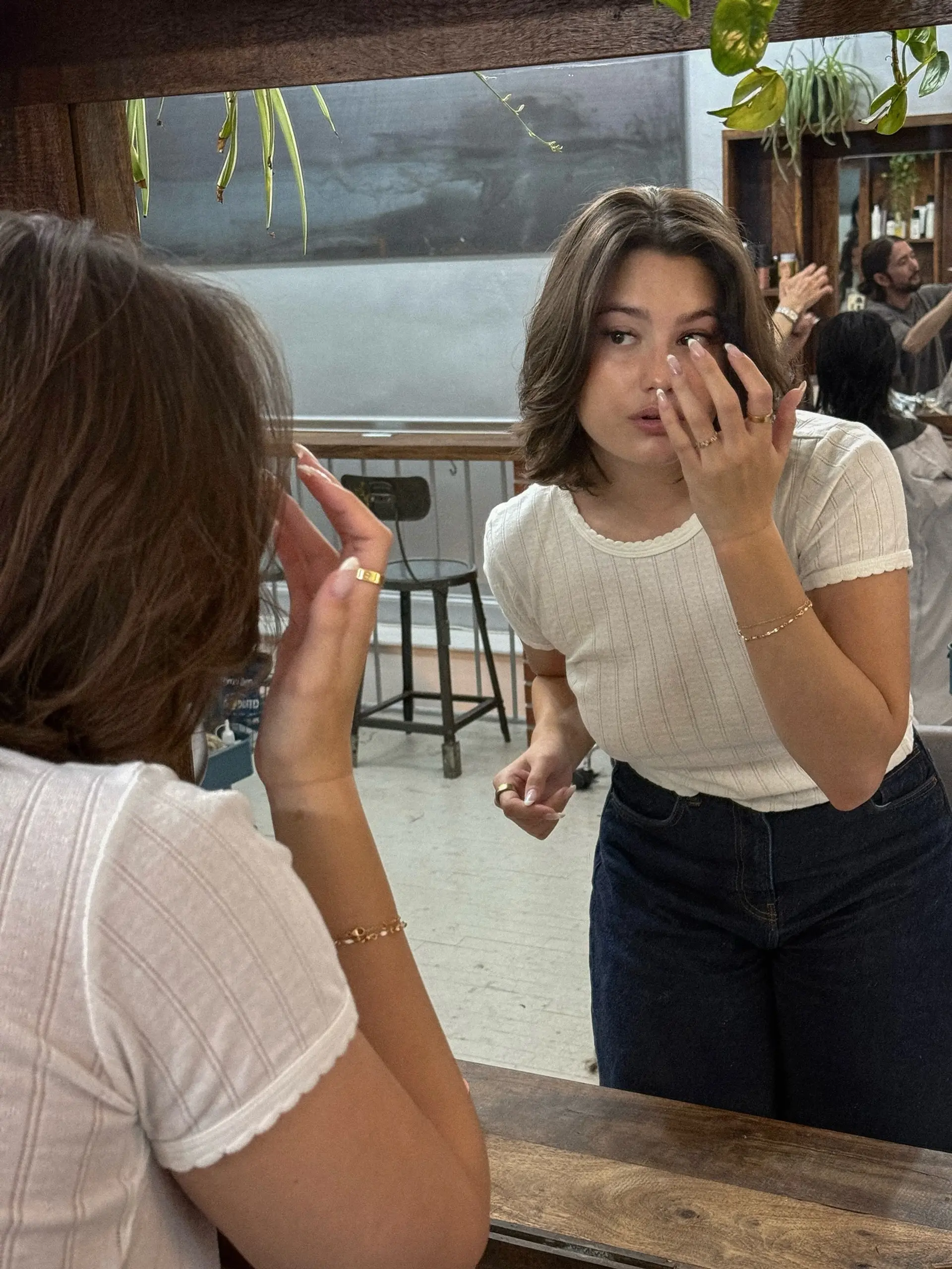 A trendy shag haircut with face-framing layers and soft curtain bangs. 2
