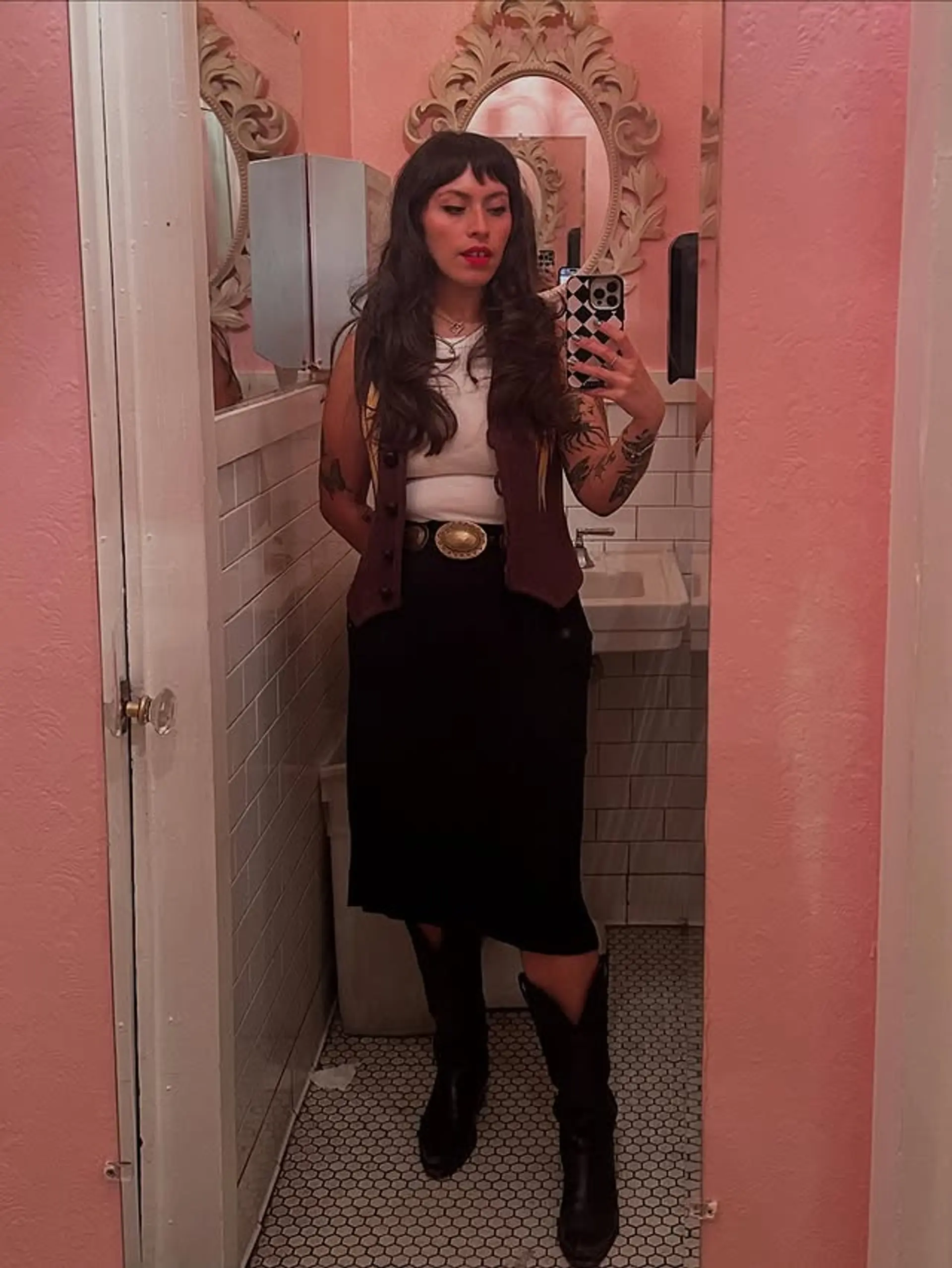 A long, wavy shag with feathered bangs, styled for a retro look. 1