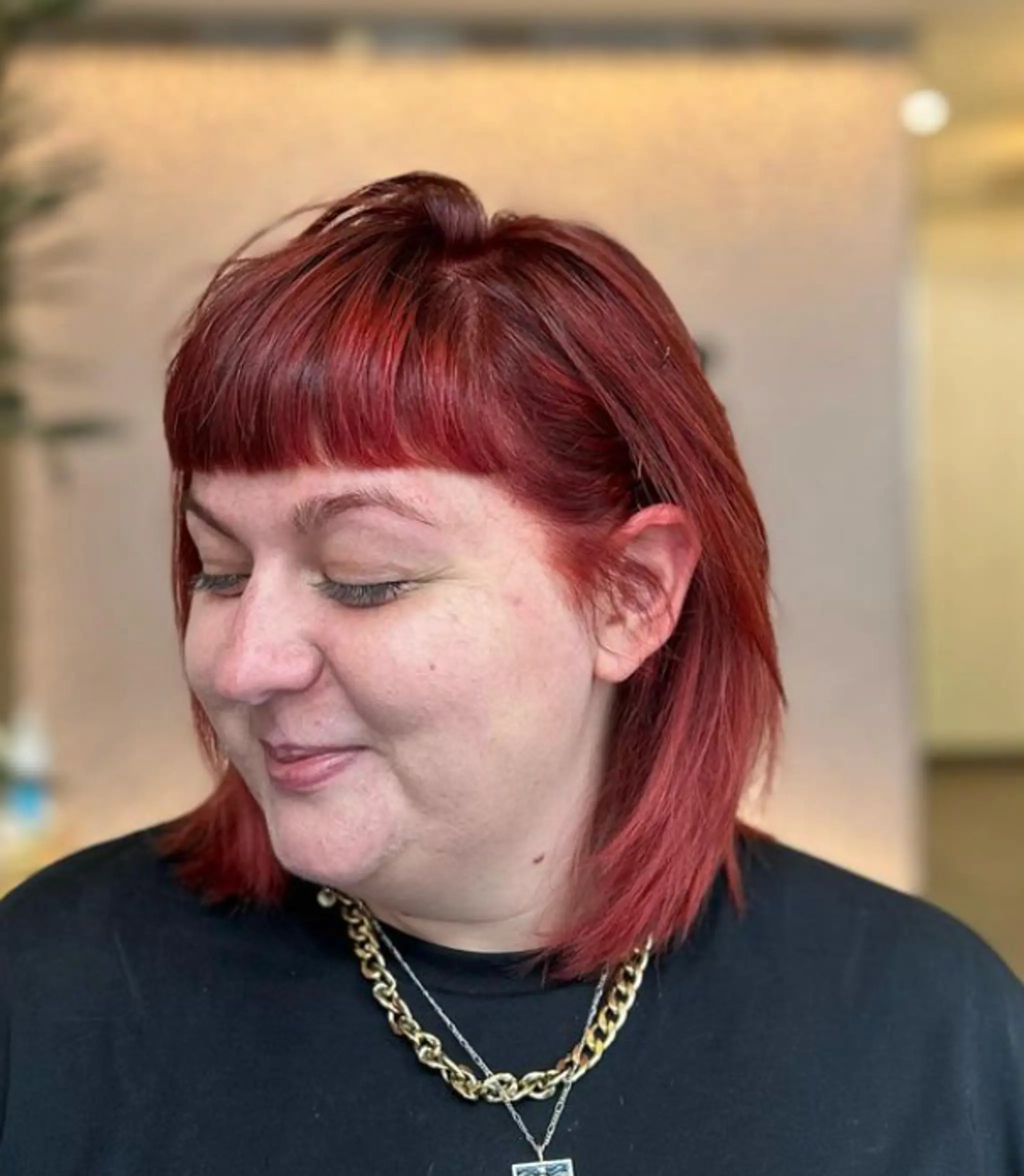 Vibrant red, medium-length bob with straight texture, blunt bangs, sharp angled cuts, and textured layers.

Color by @simabeautynyc
Cut and style by @juliamannino_hair
 2