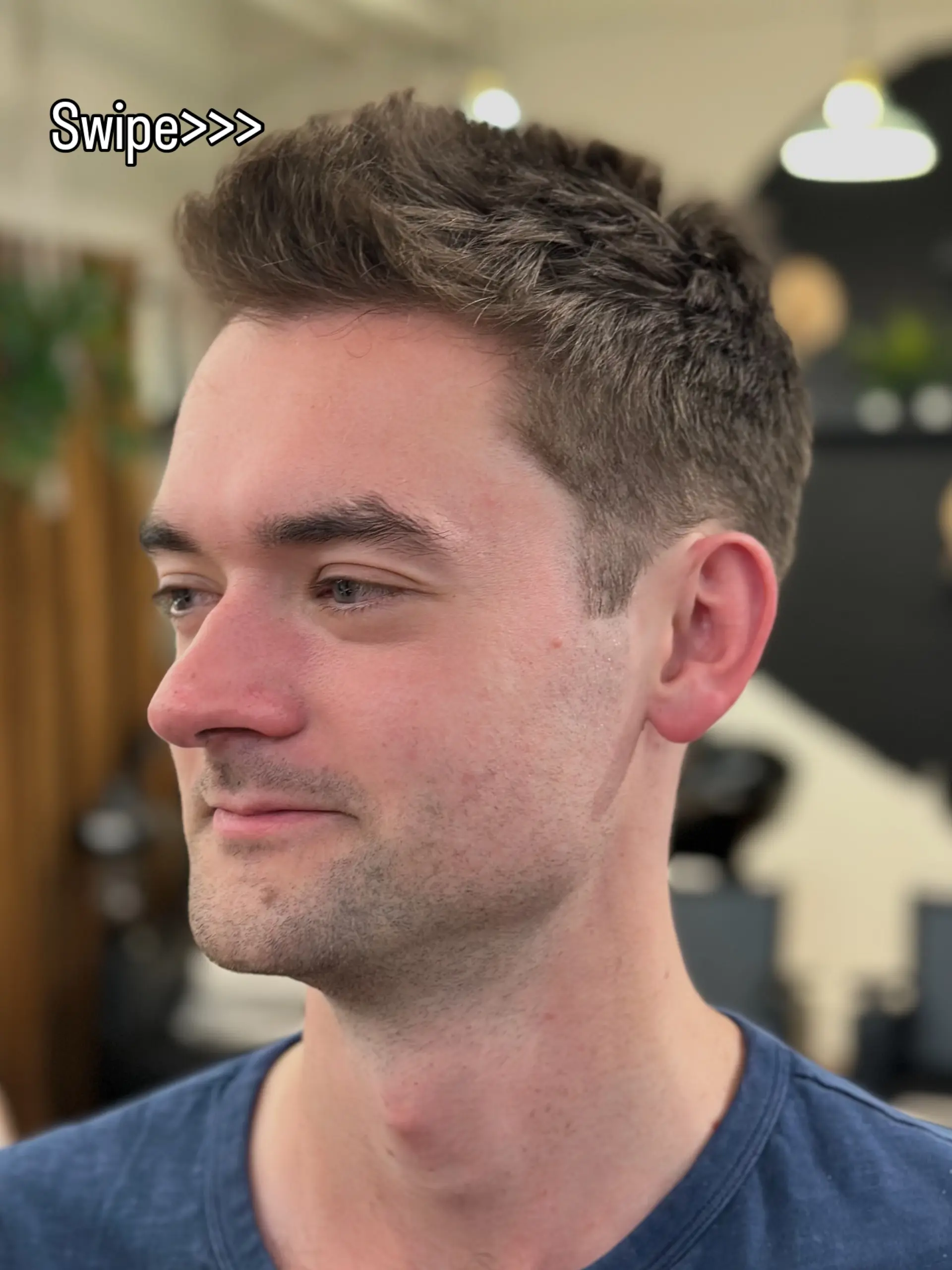 A clean, modern short haircut with tapered sides and a textured, piecey top. 1