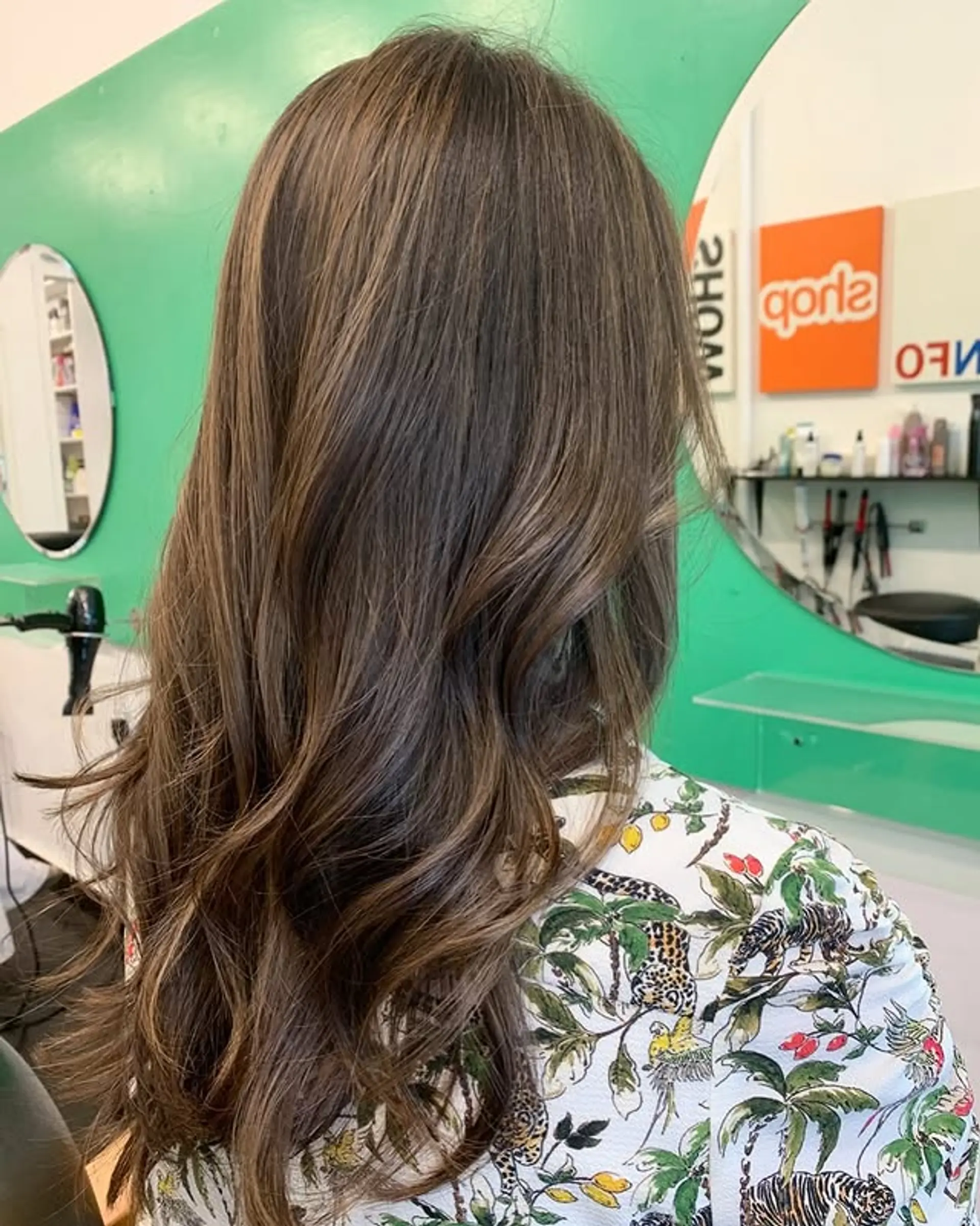 Long, wavy hairstyle with a chocolate bronde balayage. 1