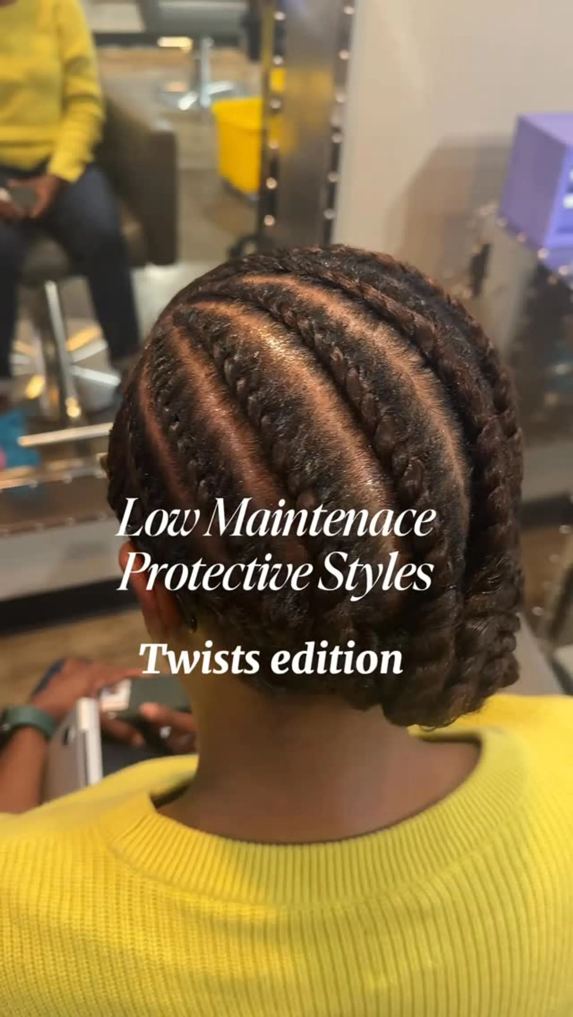 Neat curved flat twists styled along the scalp into a low protective updo. 1