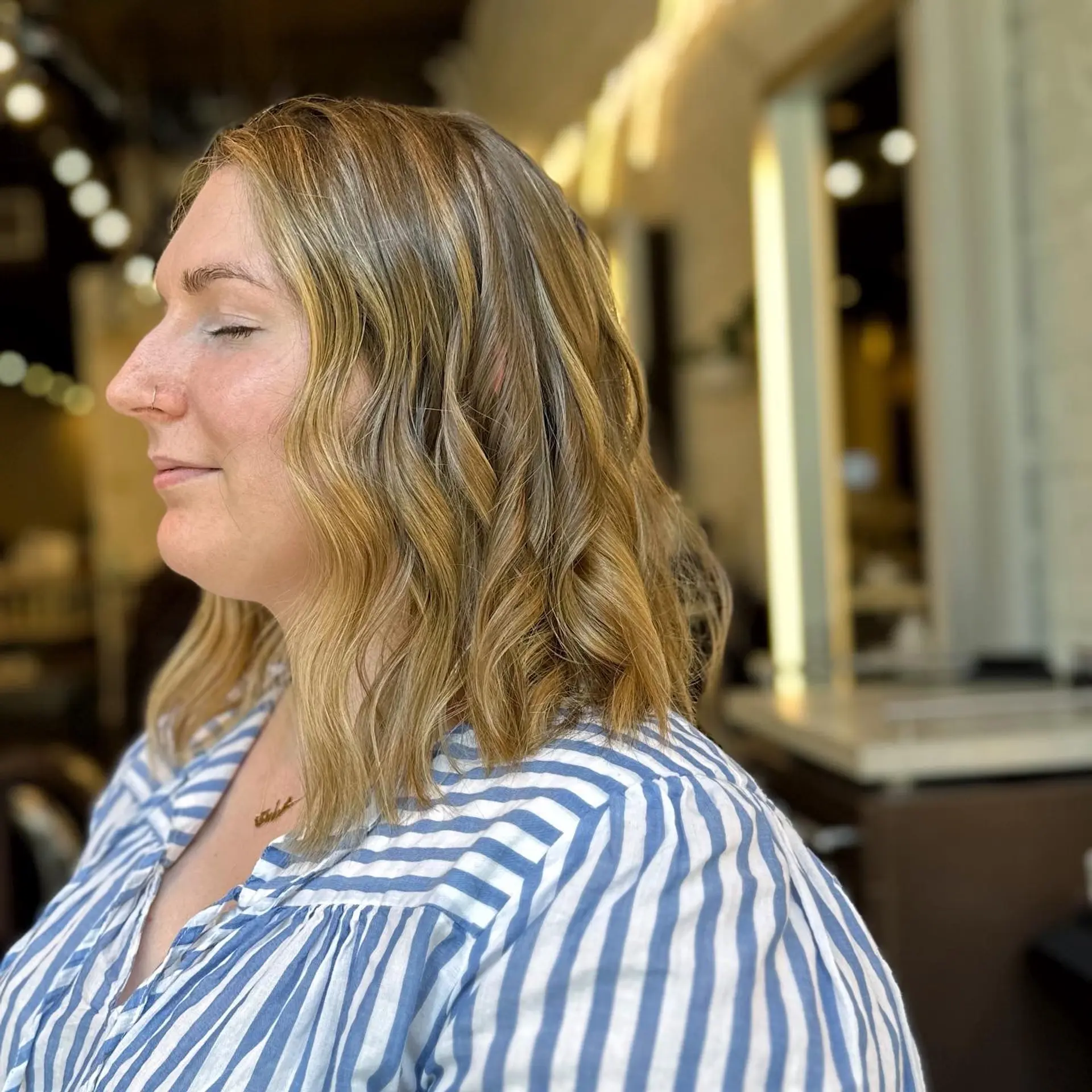 A bronde lob (long bob) with loose beach waves for an effortless, chic look. 1