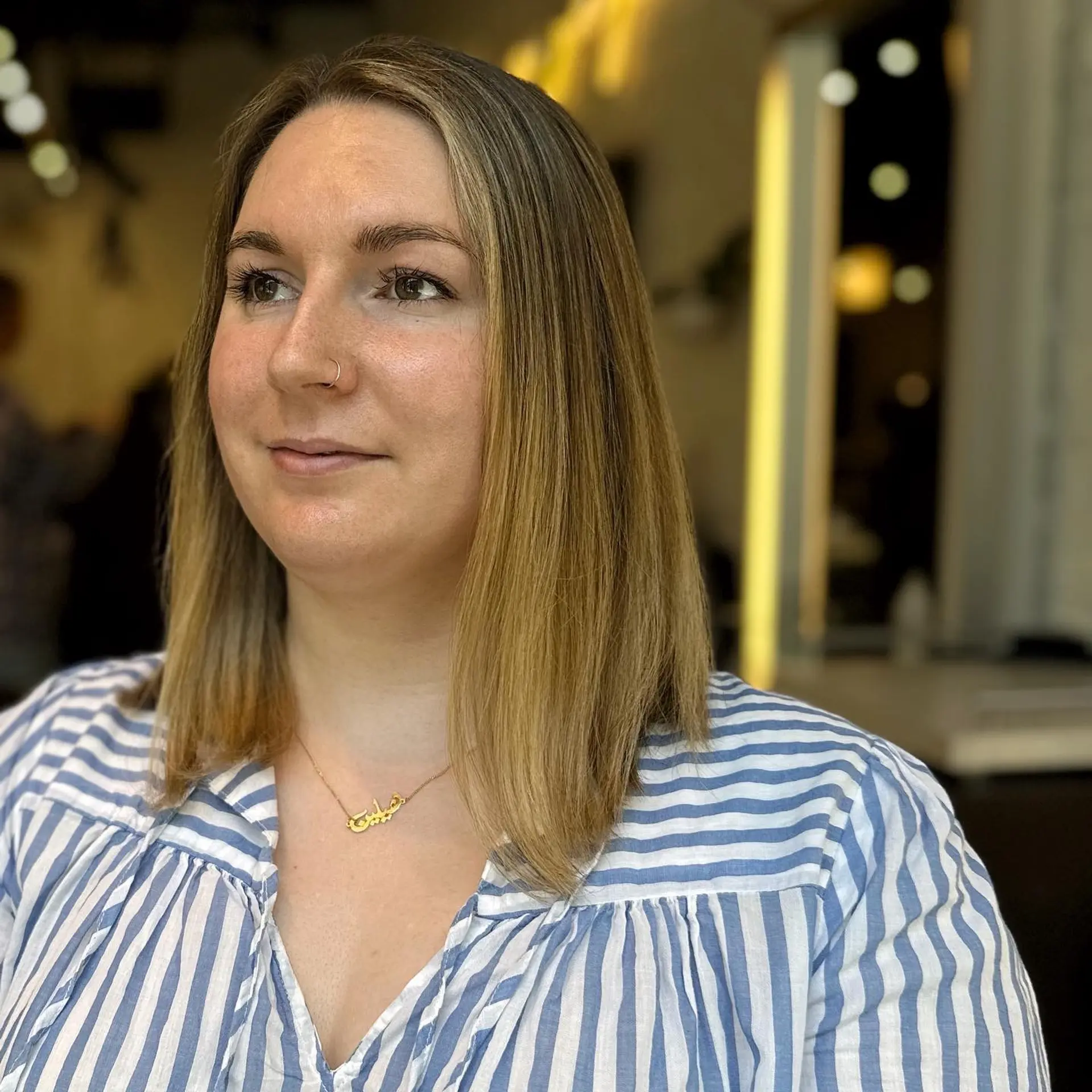 A bronde lob (long bob) with loose beach waves for an effortless, chic look. 2