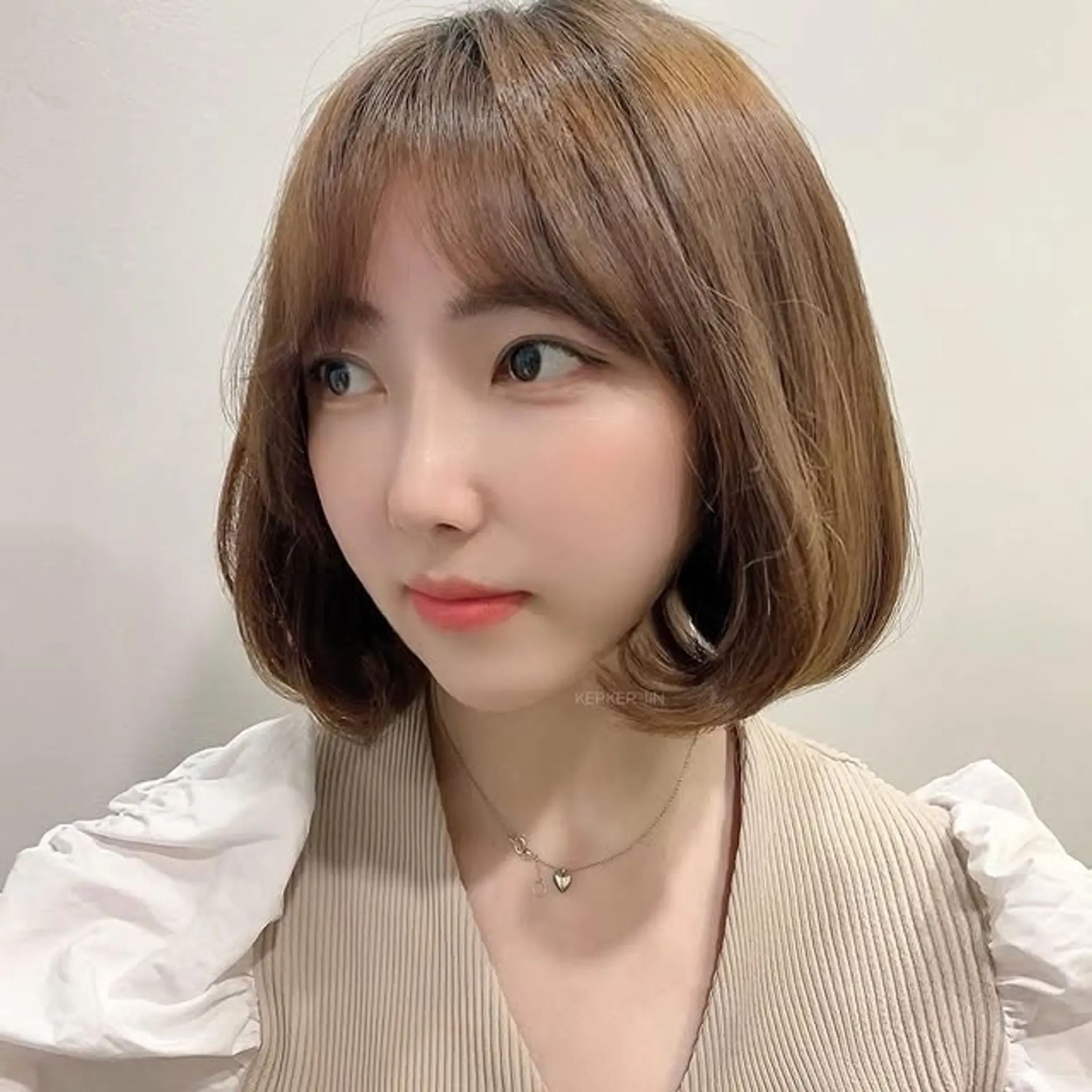 A soft bob with see through bangs. 1