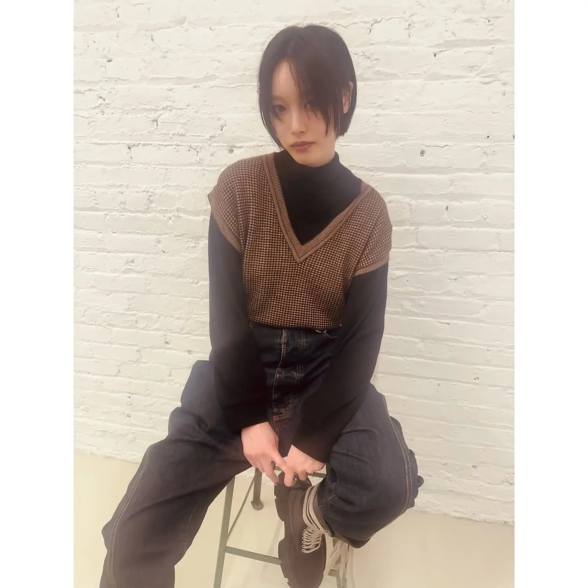 A chic and edgy blunt bob with bangs. 1